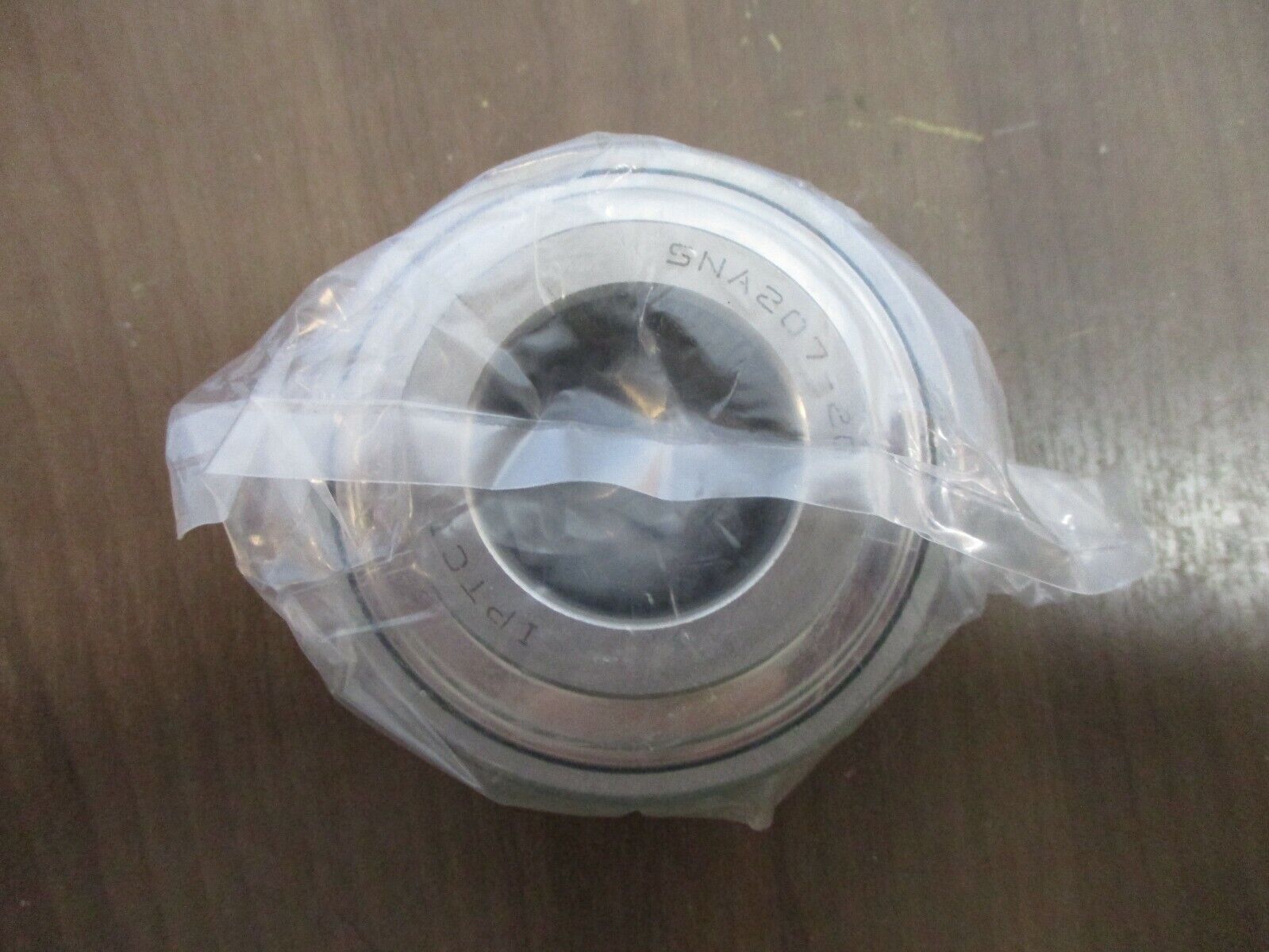 IPTCI Eccentric Locking Bearing Insert SNA 207 20 1¼" Stainless Steel