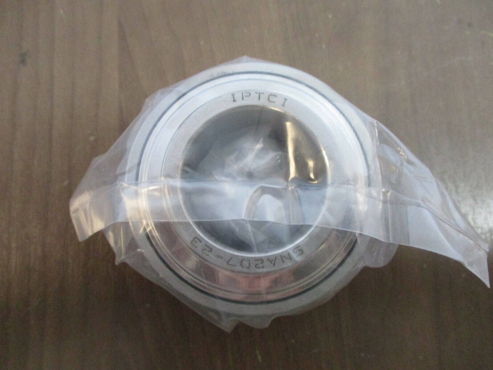 IPTCI Eccentric Locking Bearing Insert SNA 207 23 1 7/16" Stainless Steel