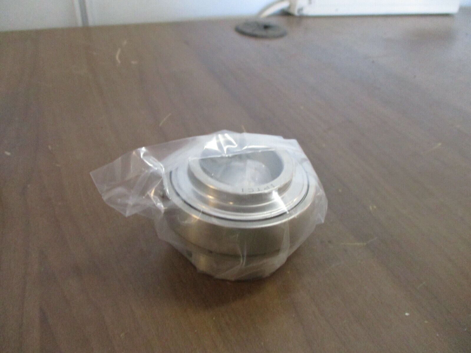 IPTCI Eccentric Locking Bearing Insert SNA 207 23 1 7/16" Stainless Steel