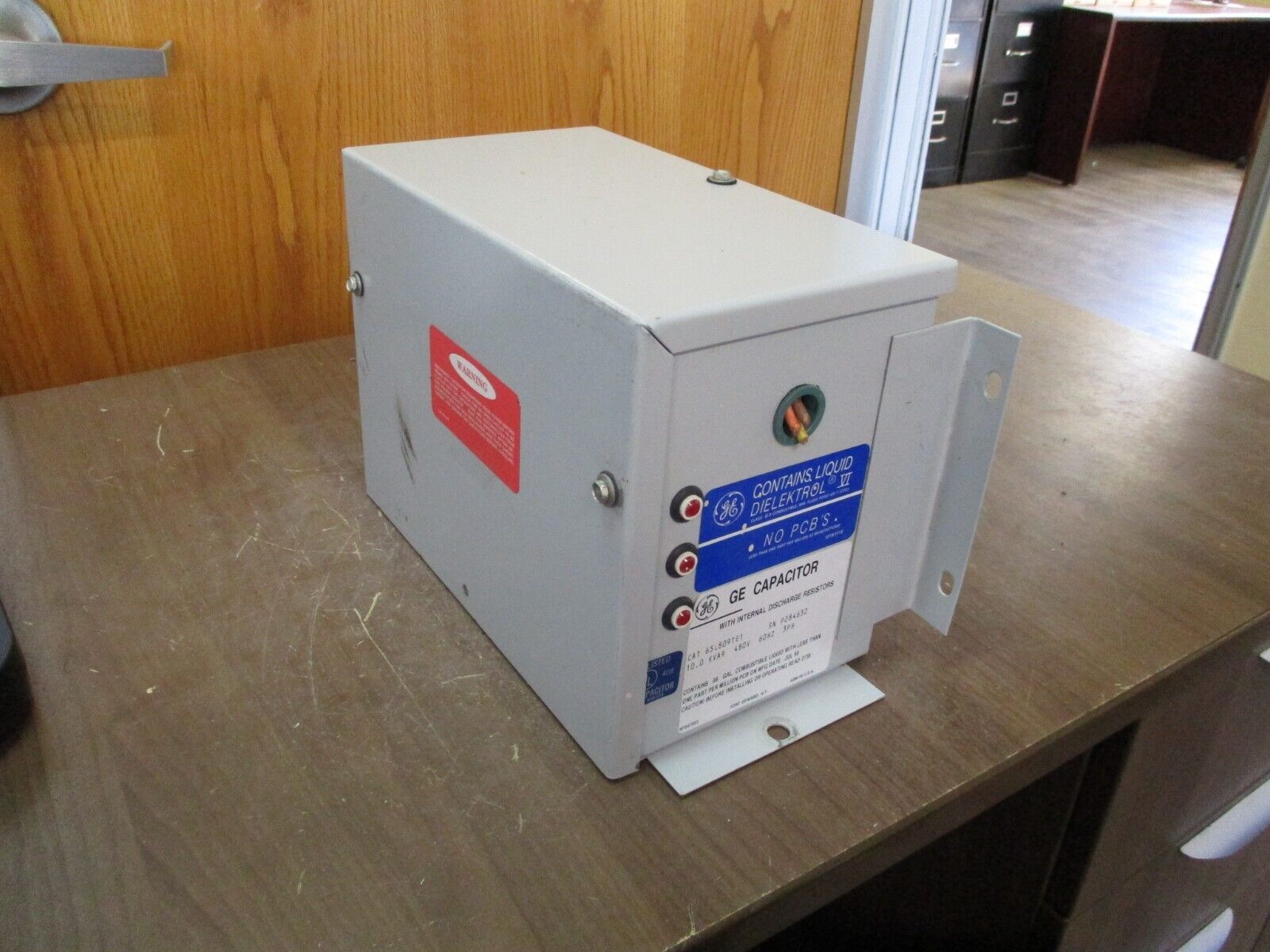 GE Capacitor 65L809TE1 10kVAR 480V 60Hz 3Ph *Broken Mounting Plate* Used
