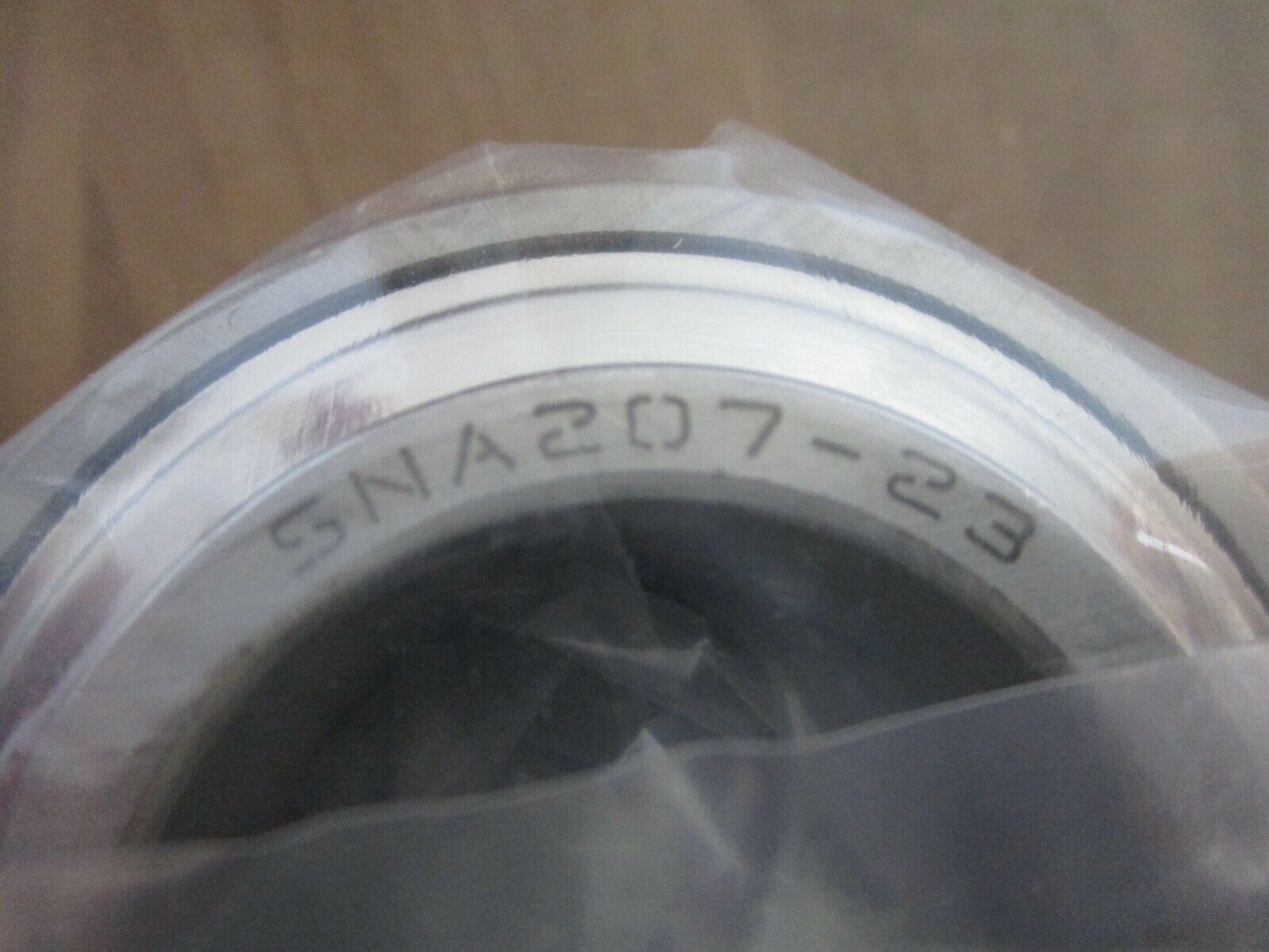 IPTCI Eccentric Locking Bearing Insert SNA 207 23 1 7/16" Stainless Steel