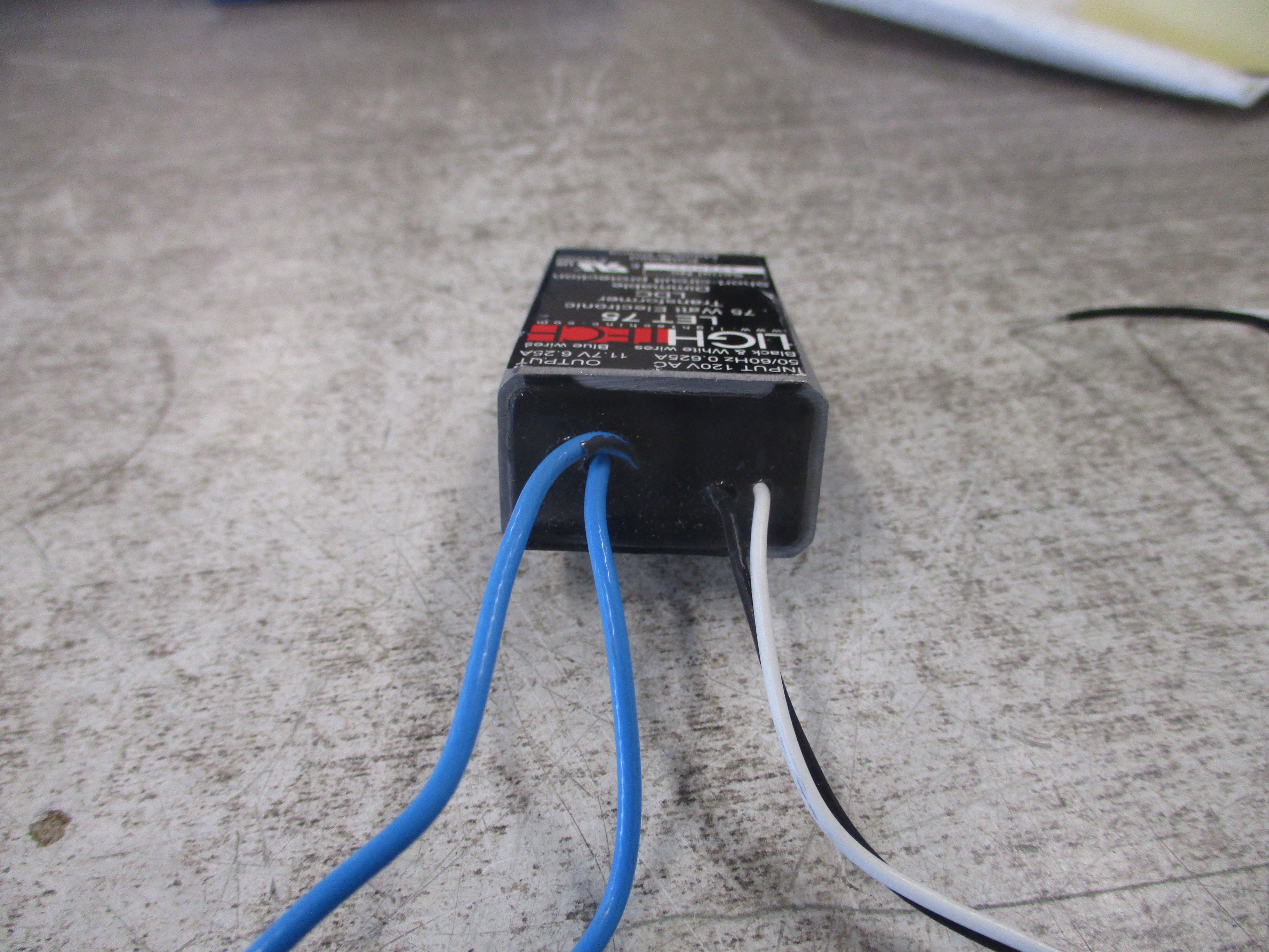 Lightech Electronic Transformer LET 75 75W Input: 120VAC 50/60Hz 0.625A Output: 11.7V 6.25A Used
