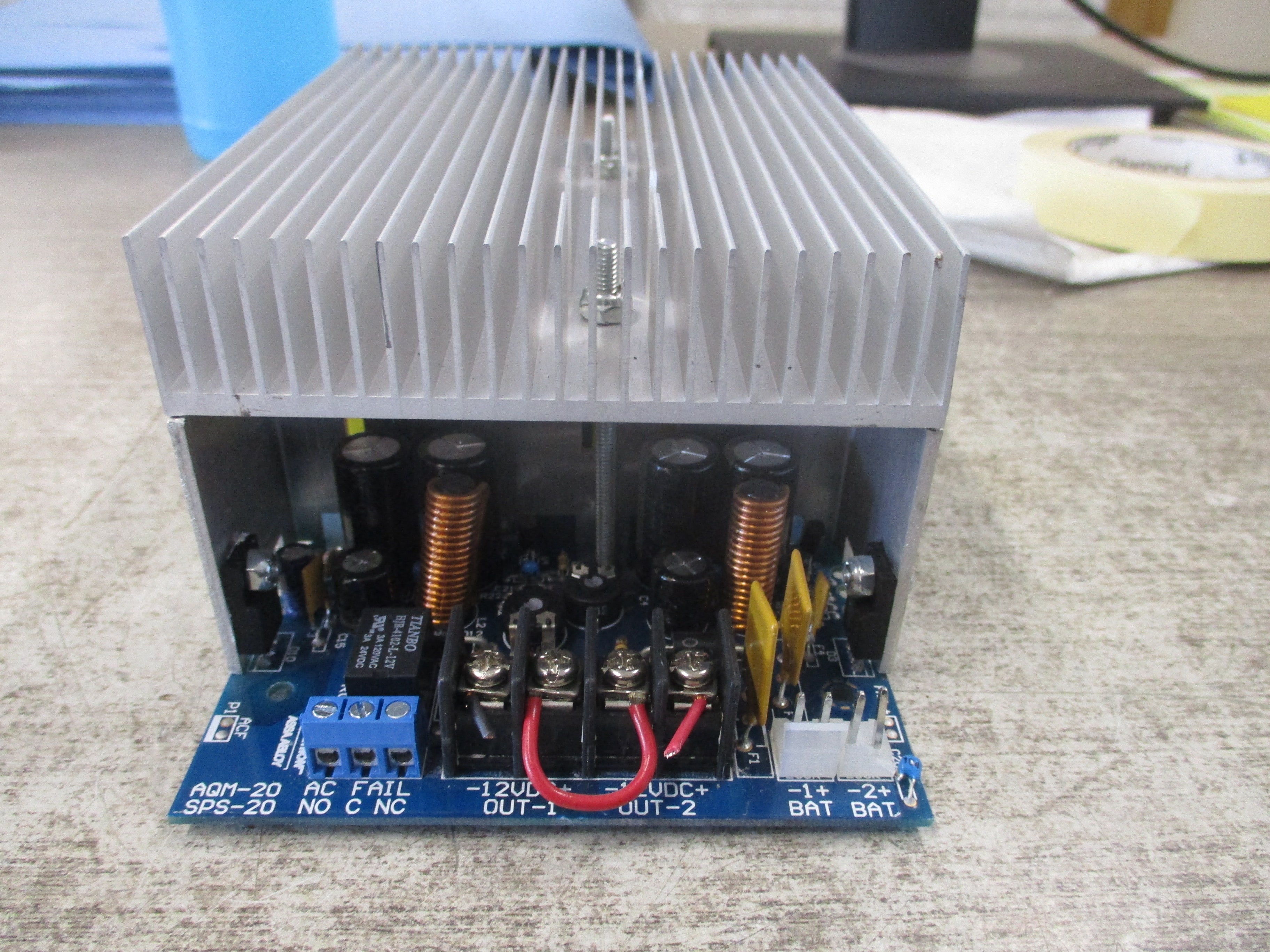 ESD Supervised Power Supply/Charger SPS-20 Input: 120/240VAC 400W Output: 12VDC 16A / 24VDC 8A *Connector Clip Broken* Used