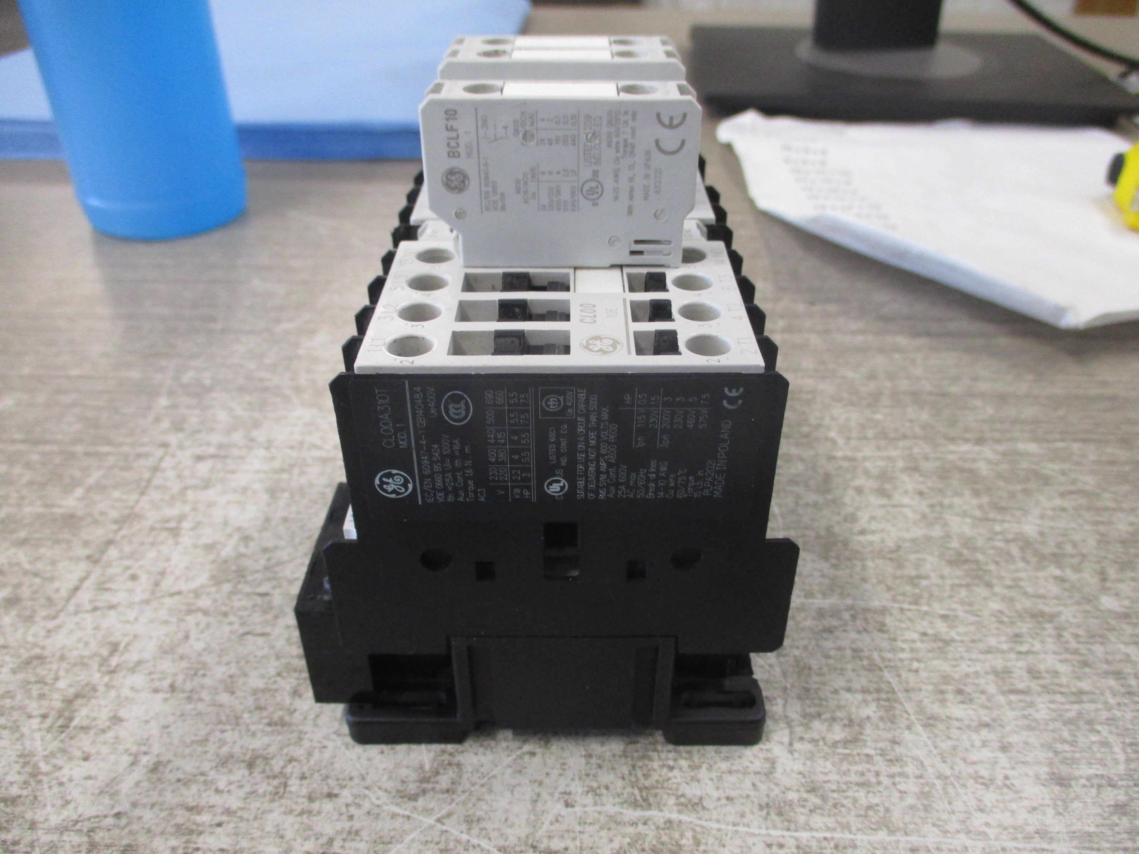 GE Reversing Contactor CL00A310T 120V coil 25A 600V (3) Aux Contacts * Chipped Insulator * Used