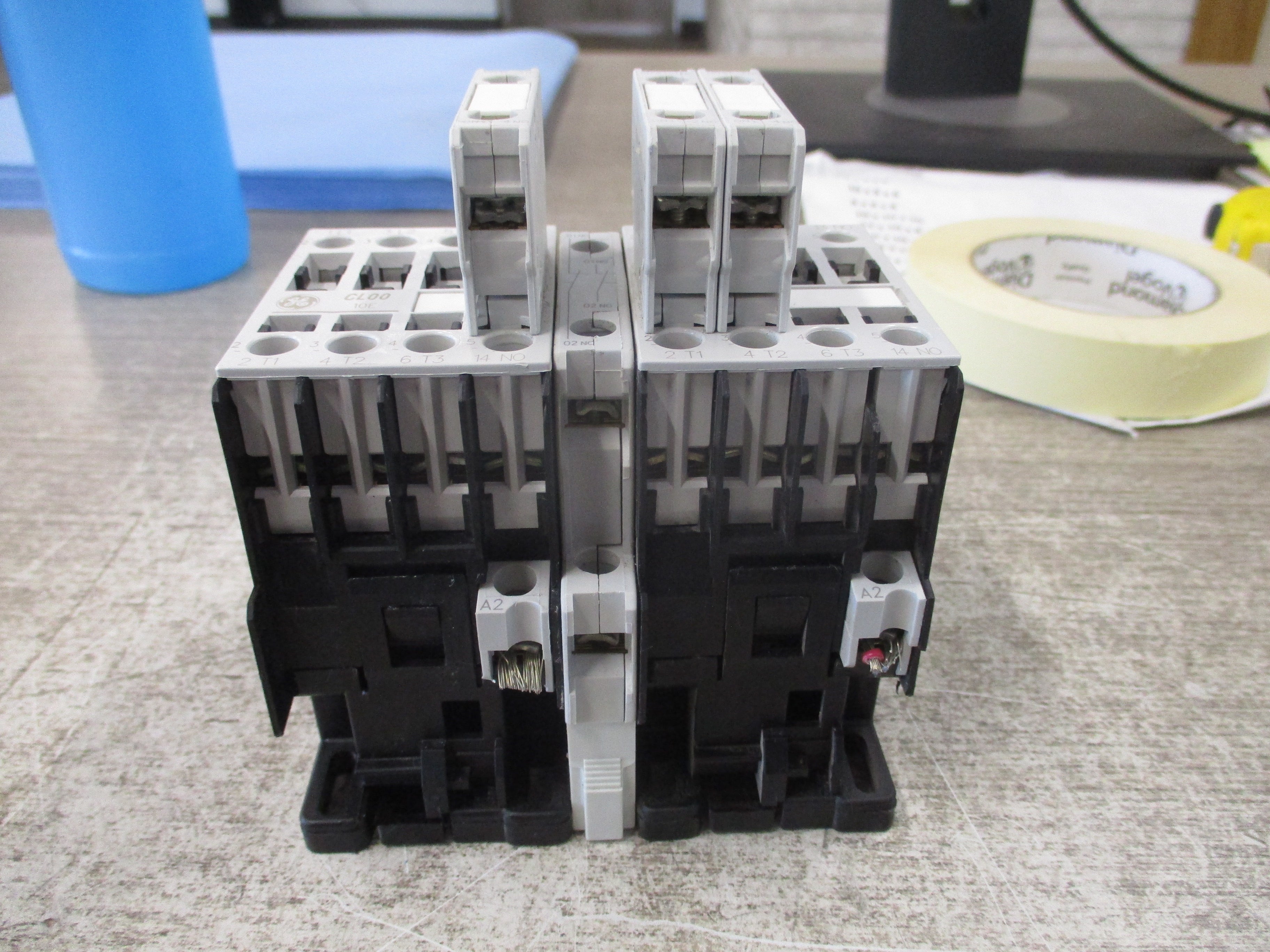 GE Reversing Contactor CL00A310T 120V coil 25A 600V (3) Aux Contacts * Chipped Insulator * Used