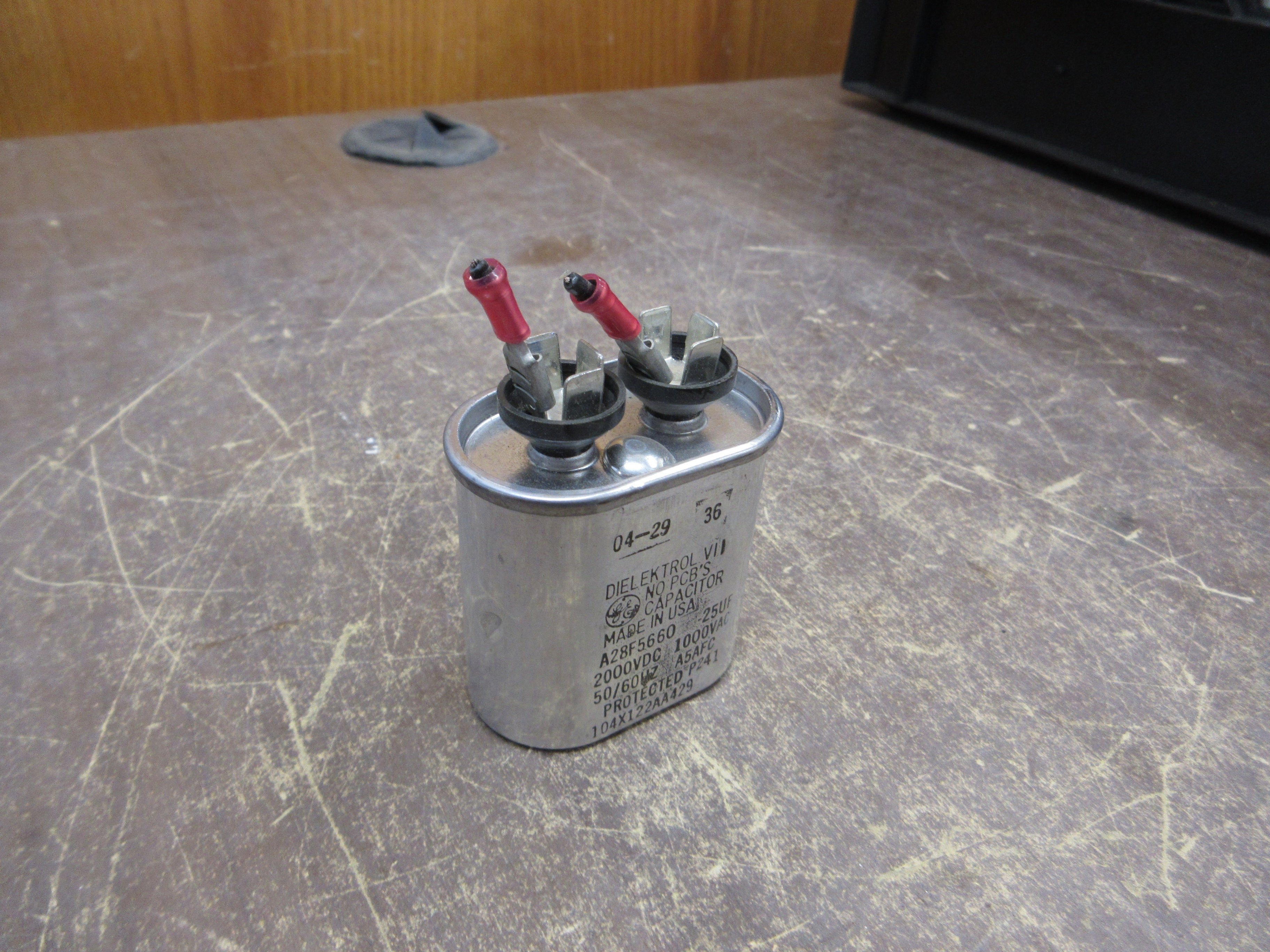 GE Dielektrol VII Capacitor A28F5660 25uF 2000VDC 1000VAC 50/60Hz *Dented* Used