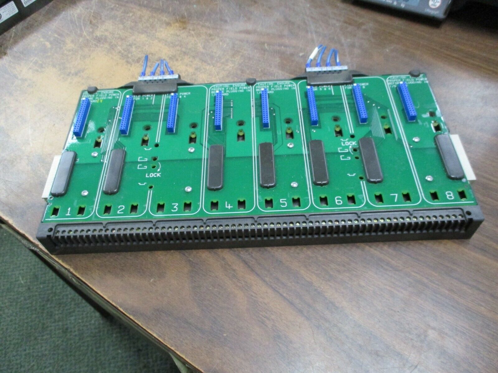 Emerson KJ4001X1-BE1 8-Wide Carrier 12P0818X072 Rev L Localbus: 12.6VDC, 8A Used