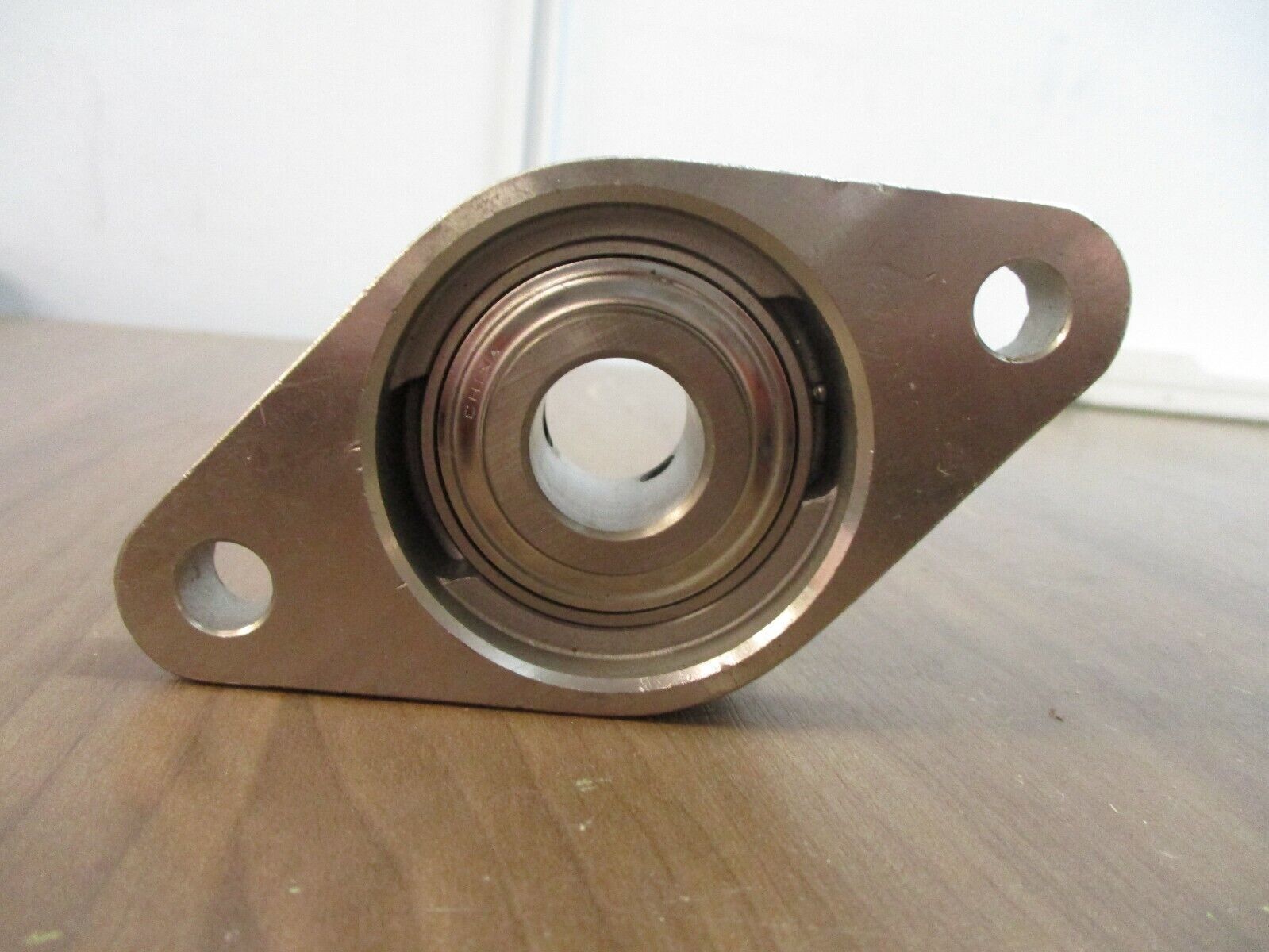 IPTCI Flange Bearing SFL204 *Missing Grease Cap* Used