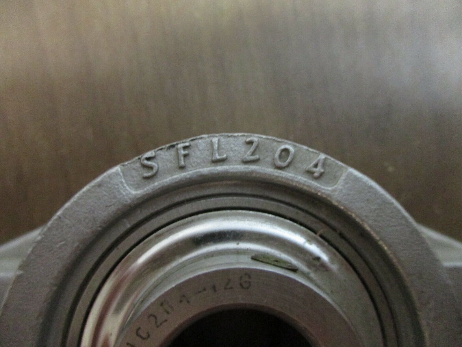 IPTCI Flange Bearing SFL204 *Missing Grease Cap* Used