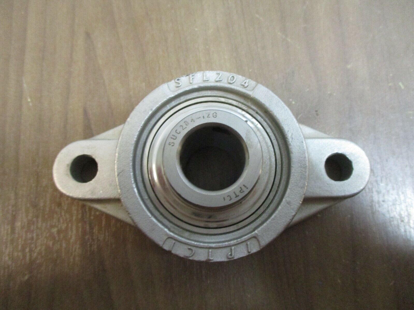 IPTCI Flange Bearing SFL204 *Missing Grease Cap* Used