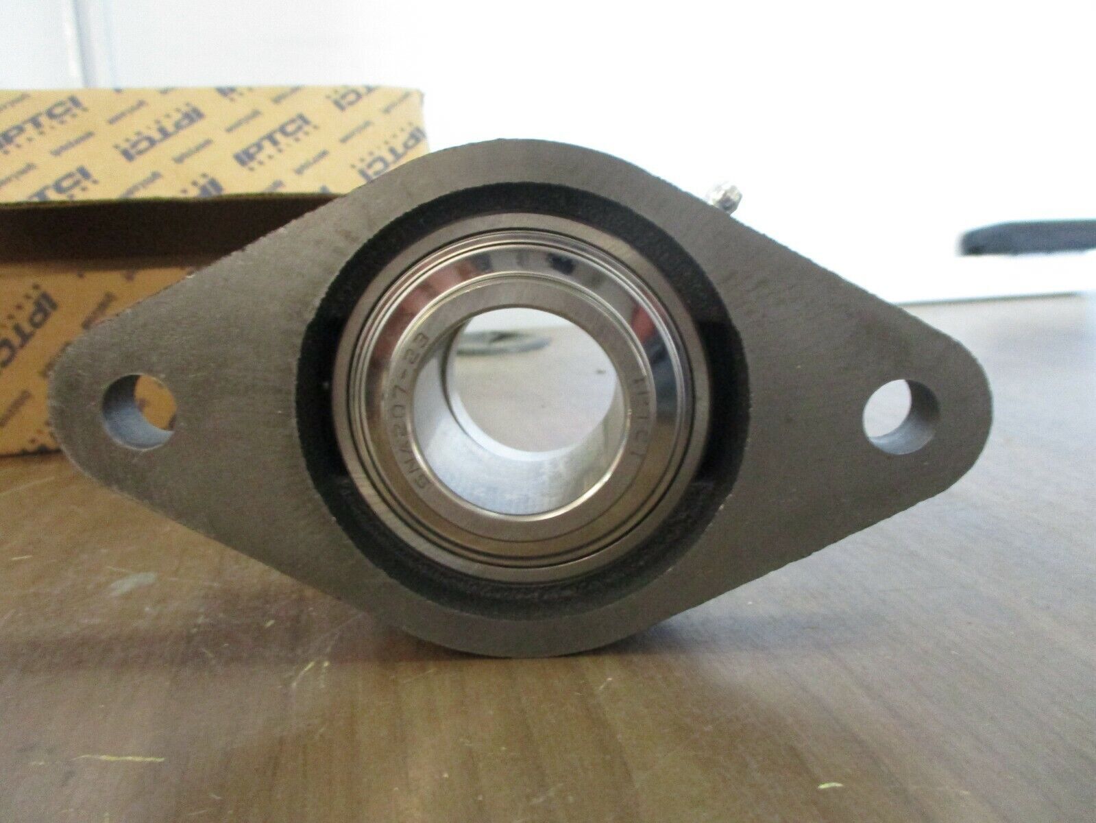 IPTCI Eccentric Locking 2-Bolt Flange SNAFL 207 23 1 7/16" Stainless / Cast Iron