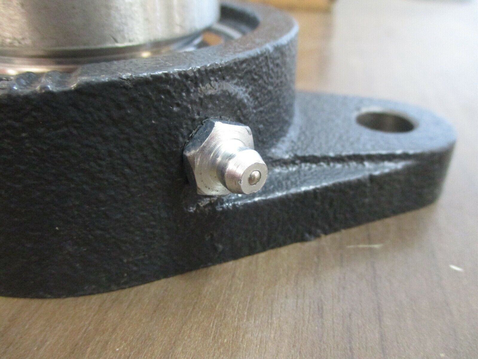 IPTCI Eccentric Locking 2-Bolt Flange SNAFL 207 20 1-1/4" Stainless / Cast Iron