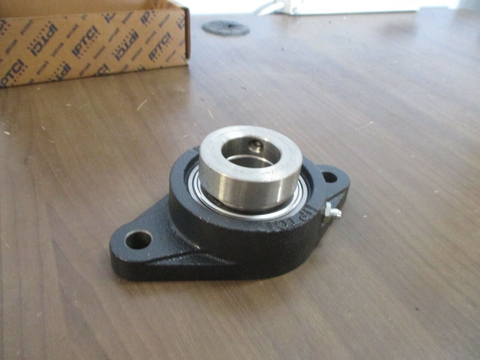 IPTCI Eccentric Locking 2-Bolt Flange SNAFL 207 20 1-1/4" Stainless / Cast Iron