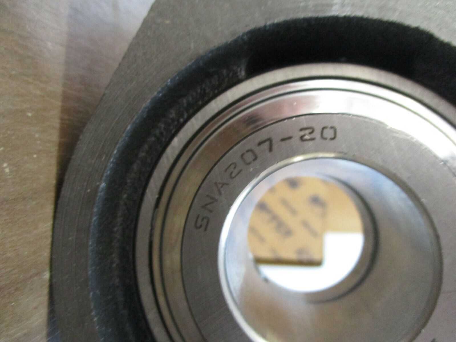 IPTCI Eccentric Locking 2-Bolt Flange SNAFL 207 20 1-1/4" Stainless / Cast Iron