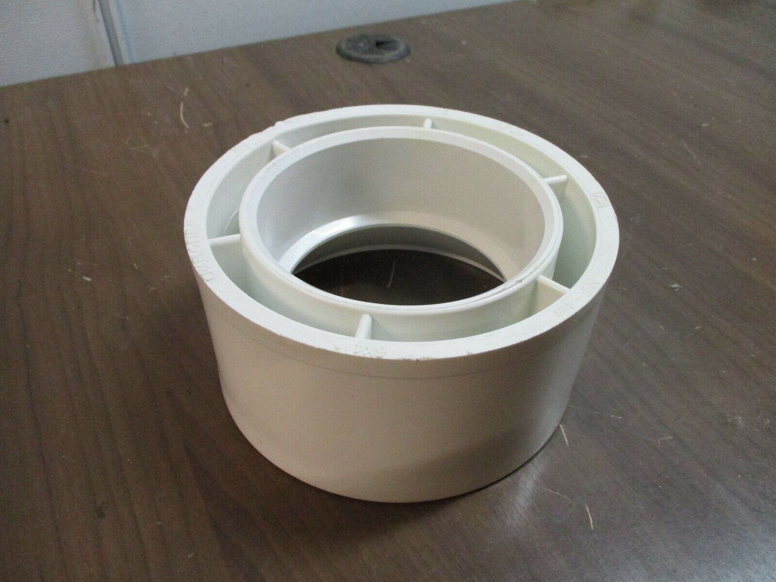 Charlotte PVC Bushing 107 Size: 6" x 4" Used