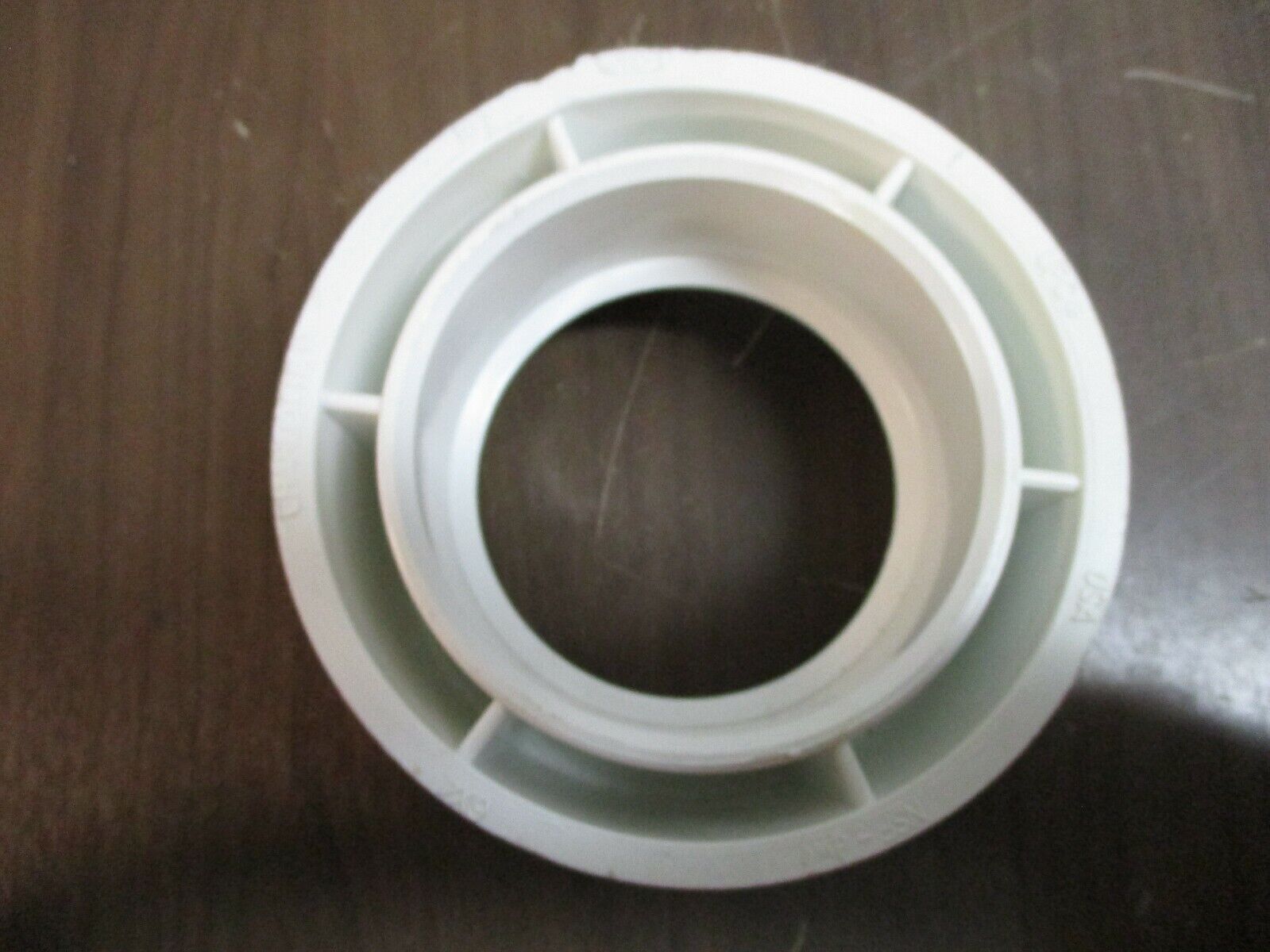 Charlotte PVC Bushing 107 Size: 6" x 4" Used