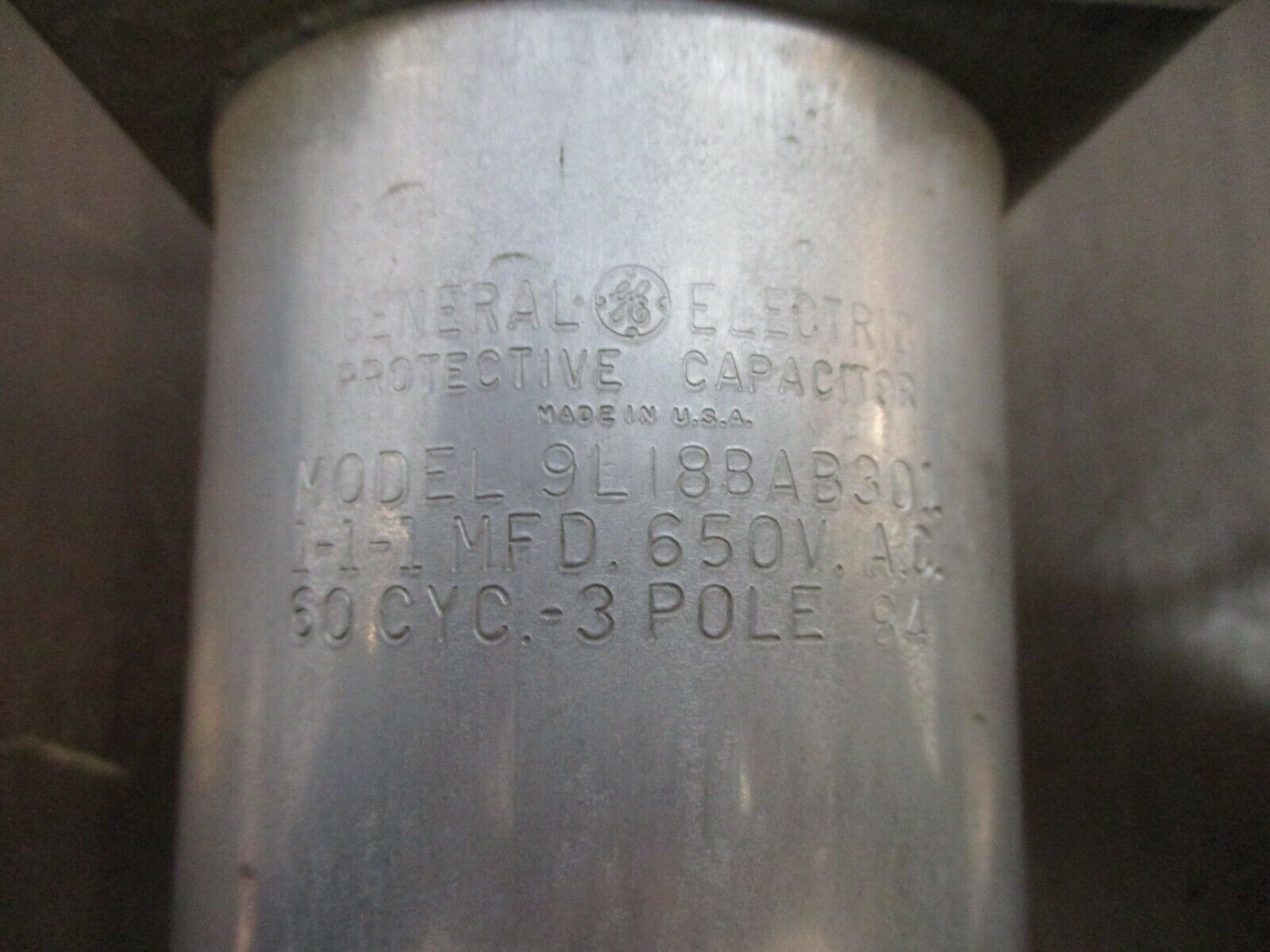 GE Protective Capacitor 9L18BAB301 650V 60Hz 3P. Used.