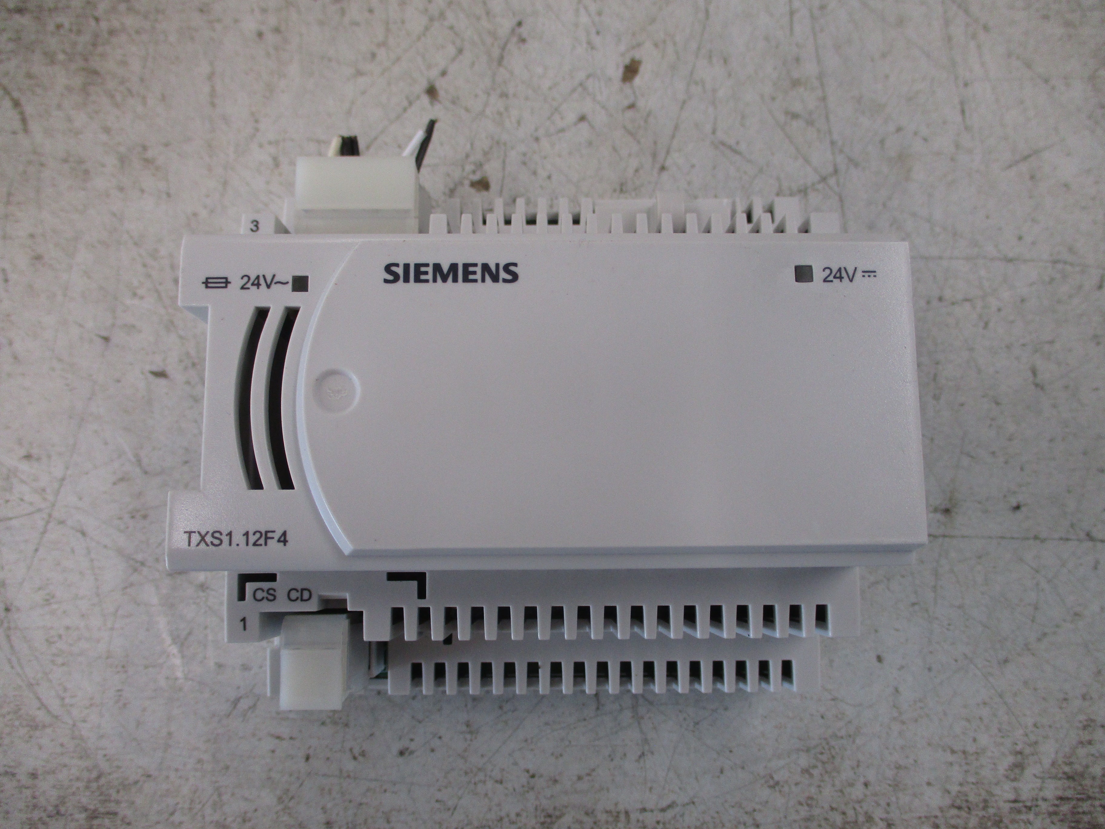 Siemens TX-I/O Power Supply Module TXS1.12F4 Input: 24VAC Output: 24V AC/DC Used