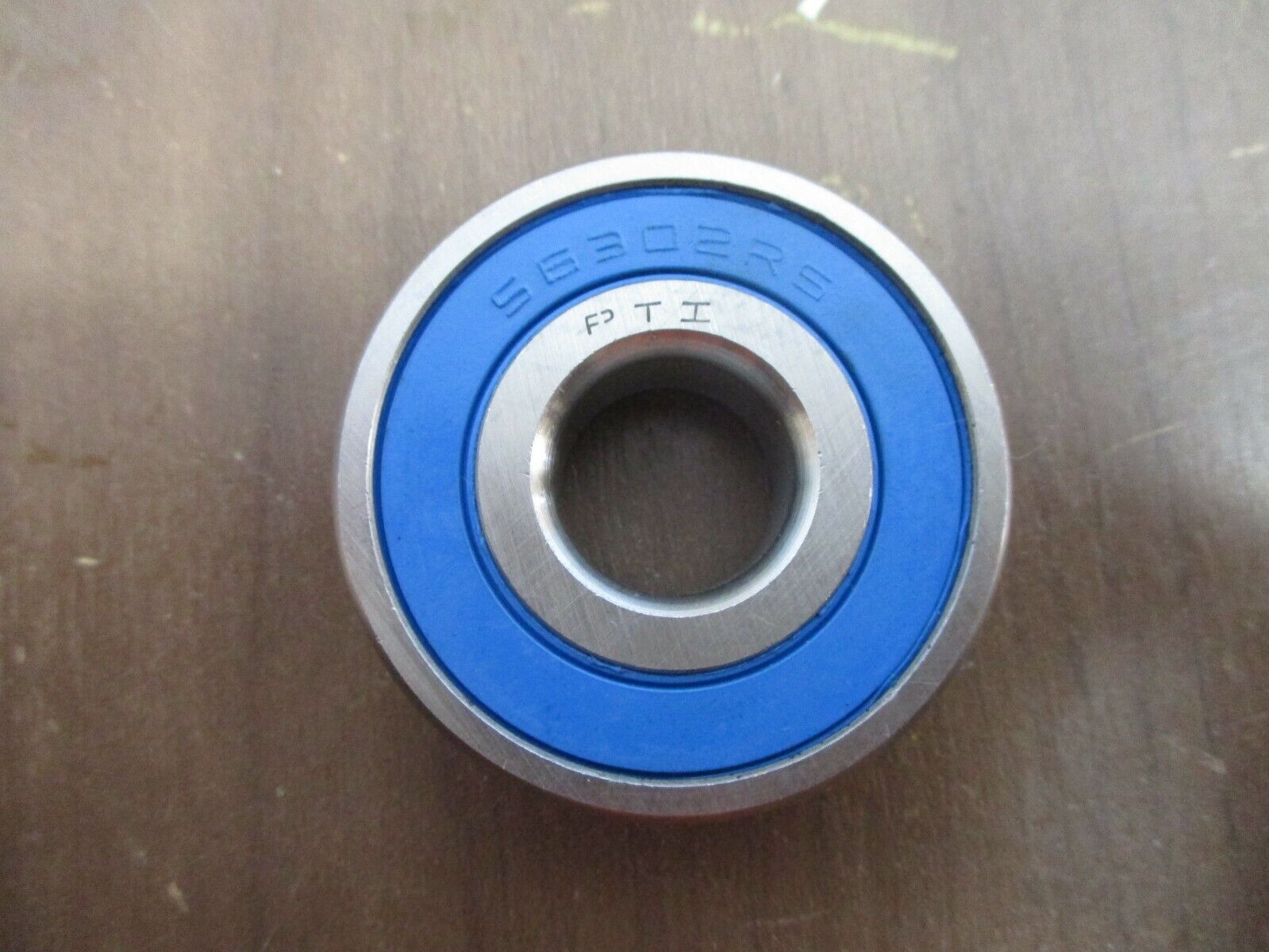 PTI Stainless Steel Ball Bearing S6302 2RS New Surplus