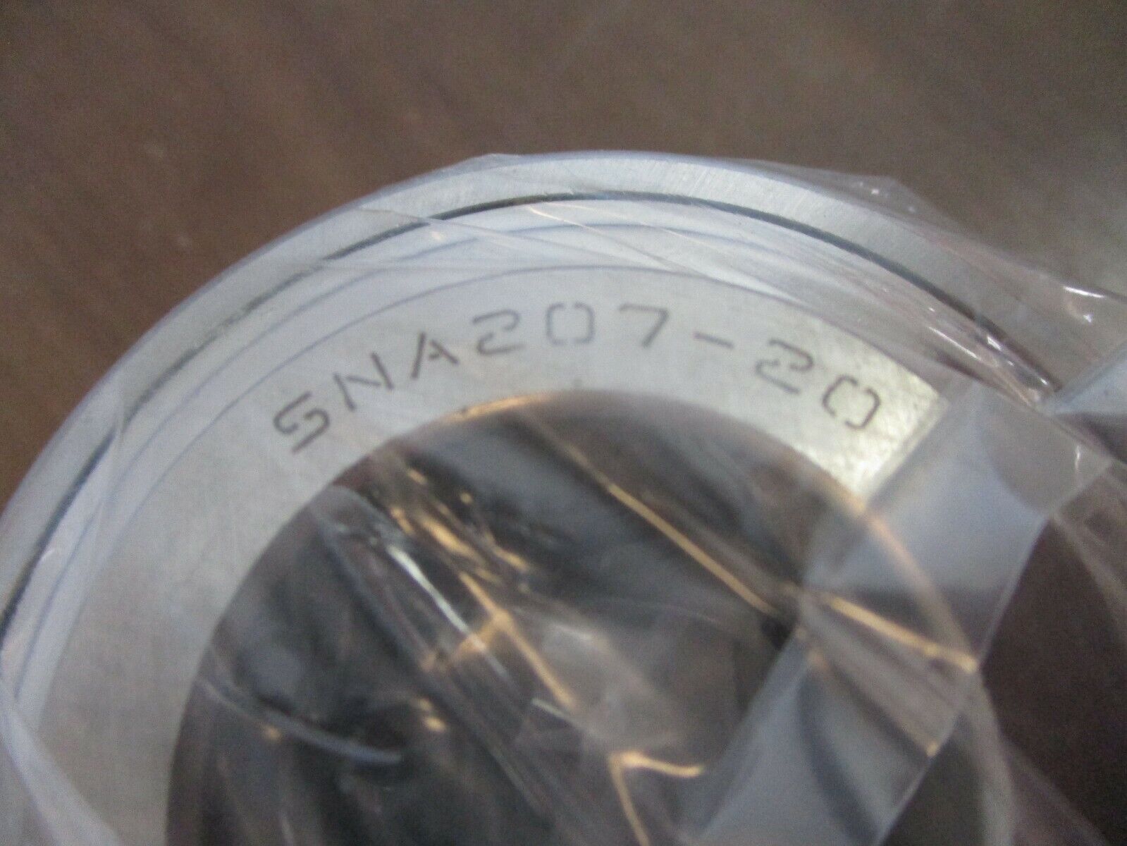 IPTCI Eccentric Locking Bearing Insert SNA 207 20 1¼" Stainless Steel