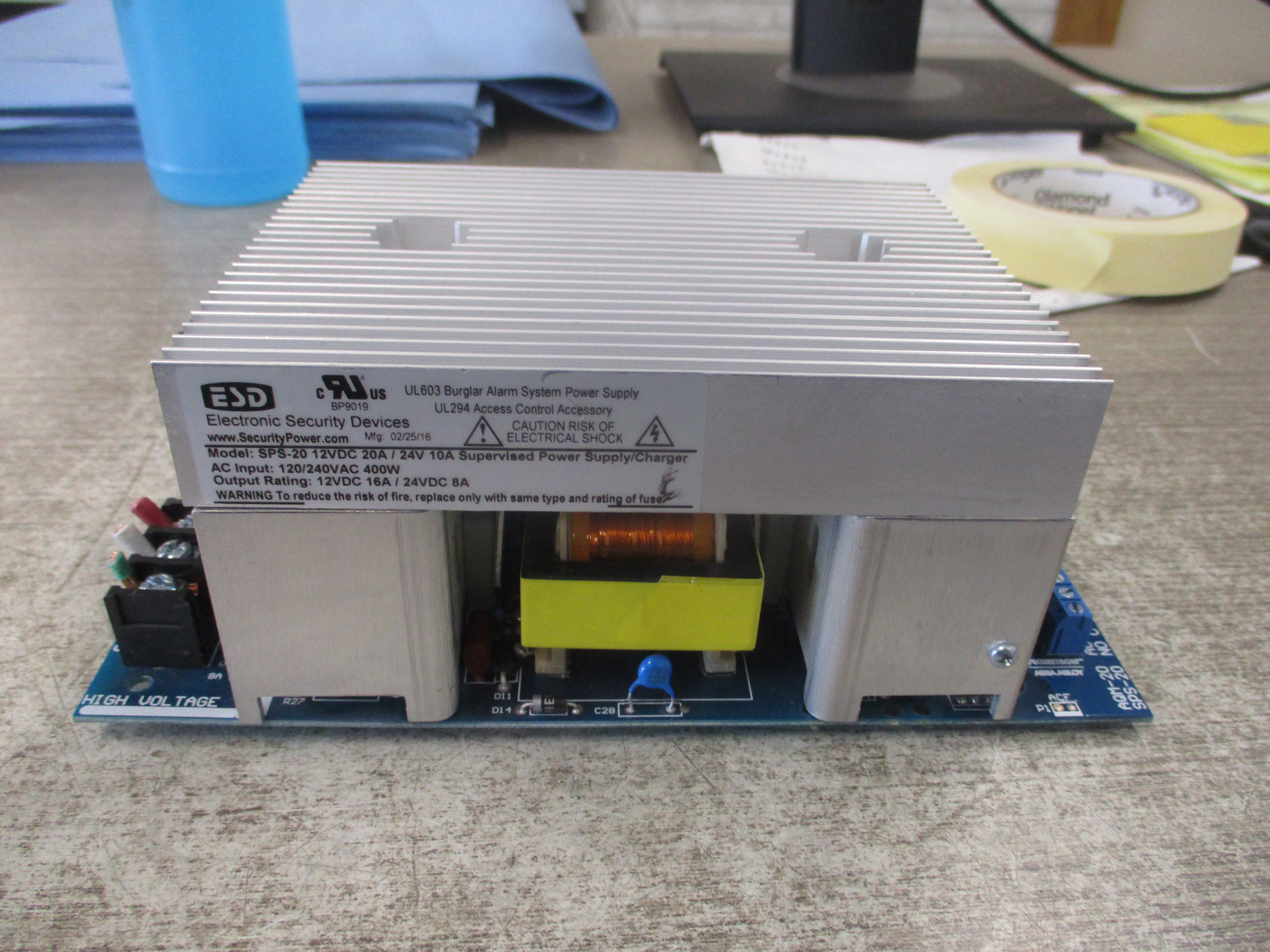 ESD Supervised Power Supply/Charger SPS-20 Input: 120/240VAC 400W Output: 12VDC 16A / 24VDC 8A *Connector Clip Broken* Used