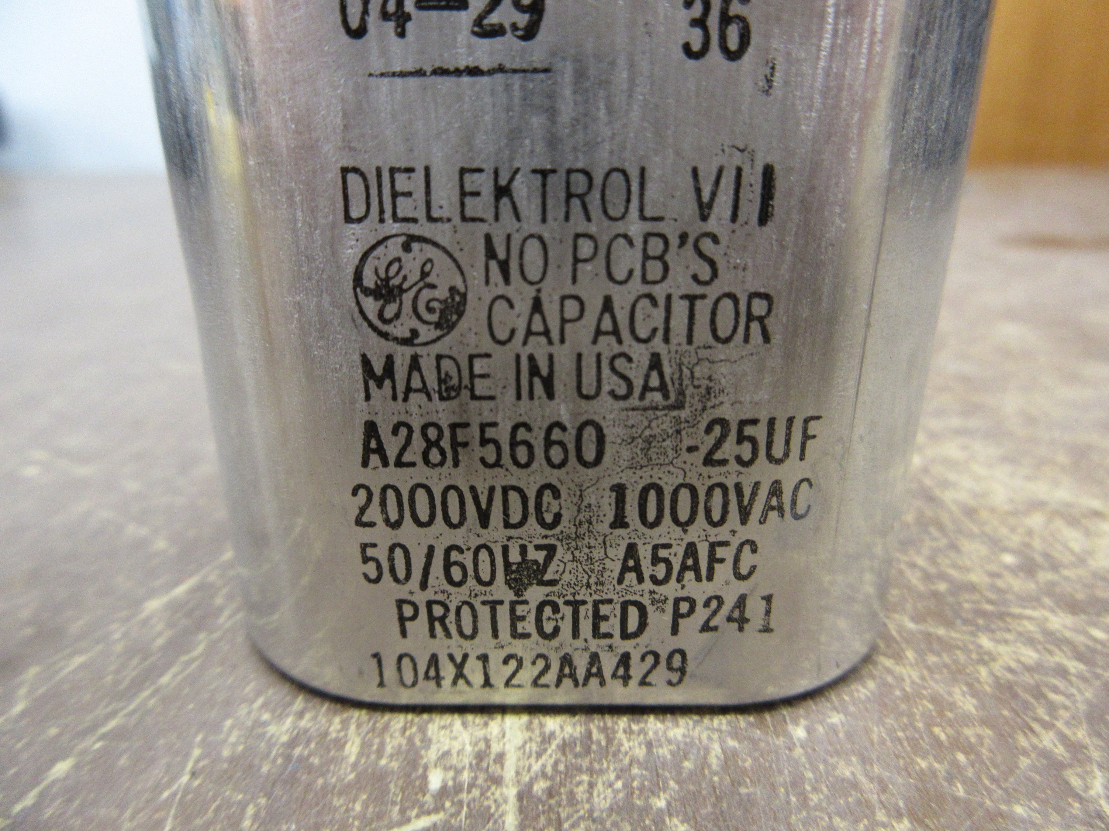 GE Dielektrol VII Capacitor A28F5660 25uF 2000VDC 1000VAC 50/60Hz *Dented* Used
