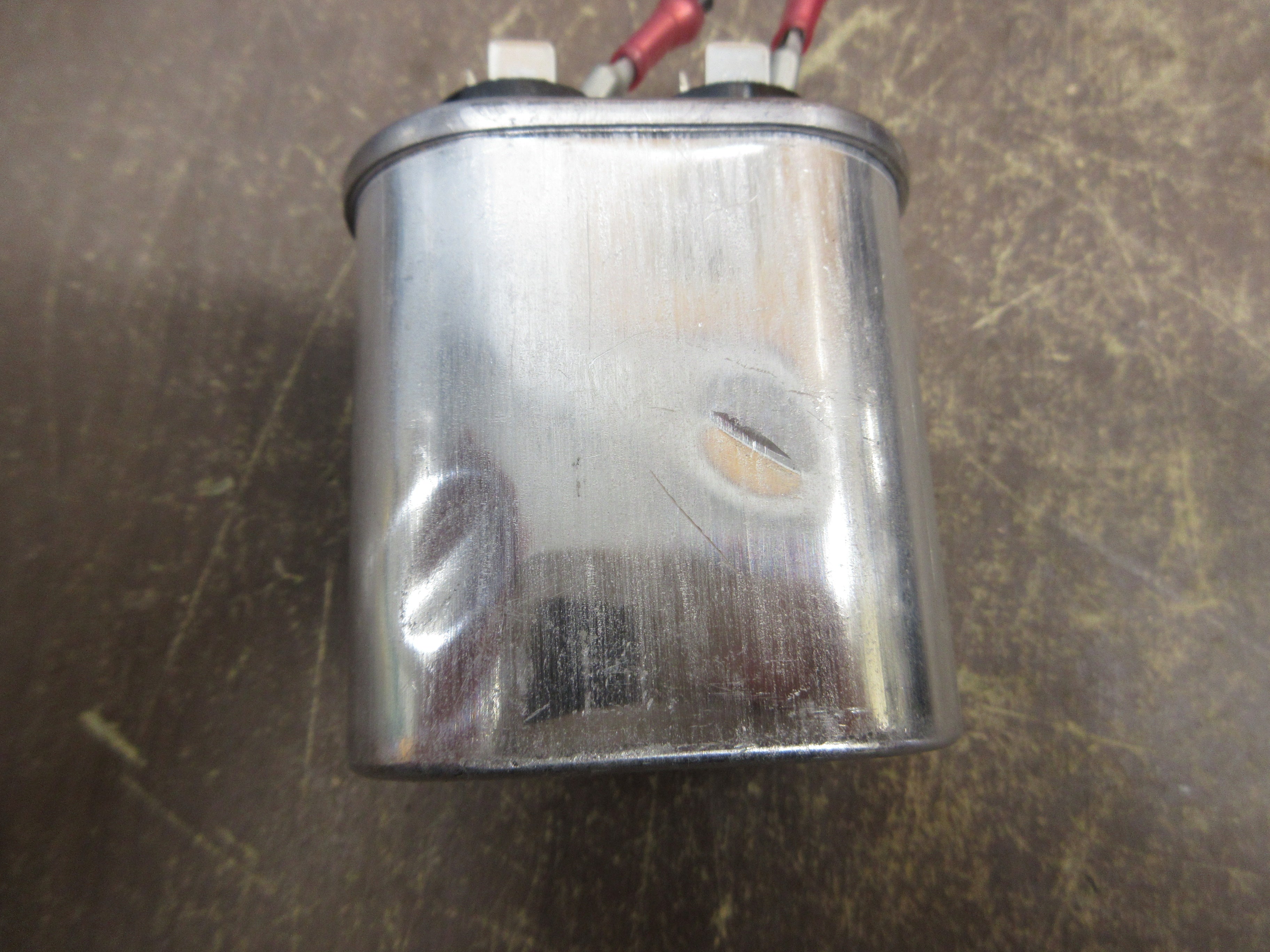 GE Dielektrol VII Capacitor A28F5660 25uF 2000VDC 1000VAC 50/60Hz *Dented* Used