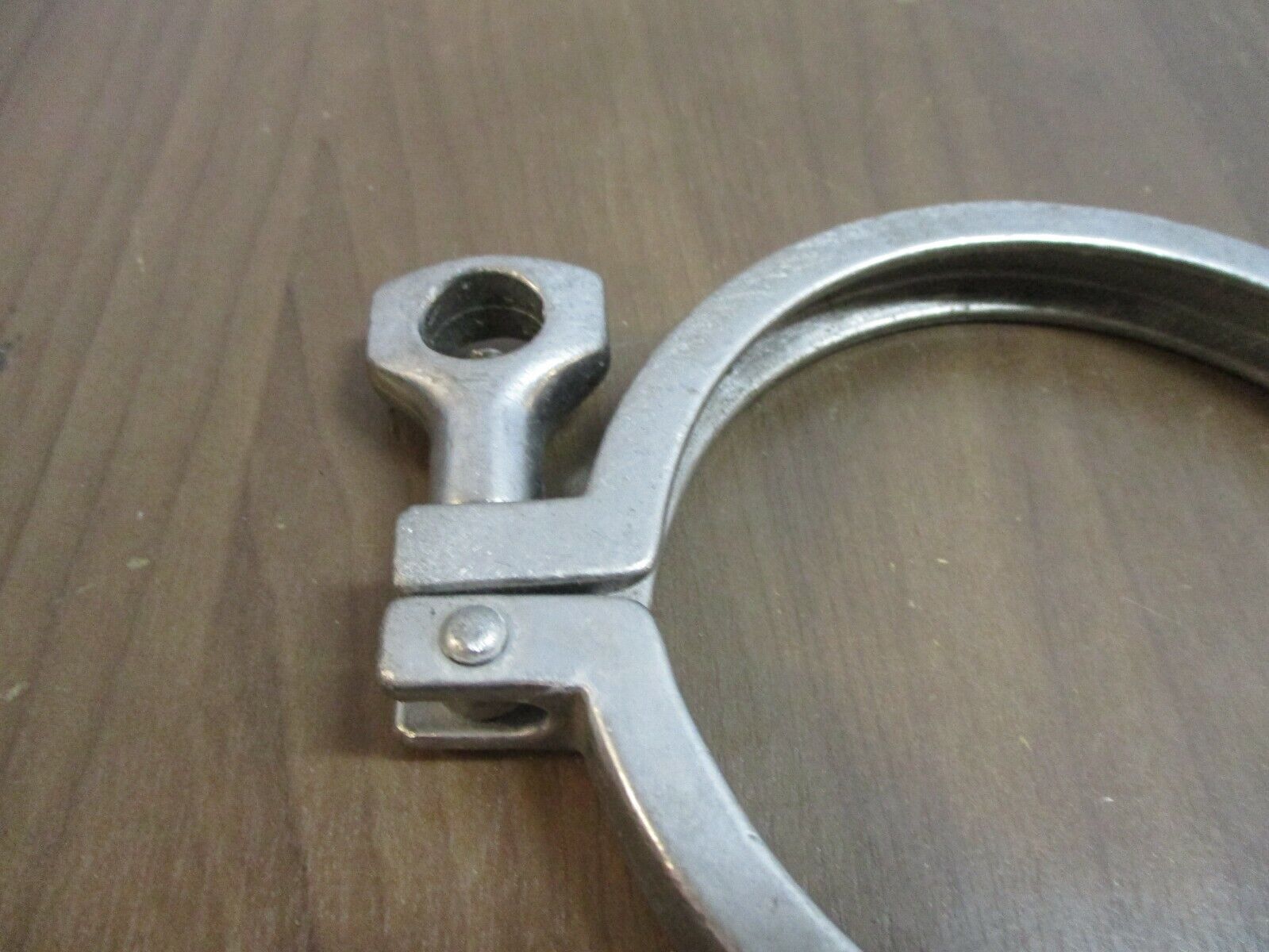 Misc. Brand Stainless Steel Sanitary Clamp Size: 4.5" Used