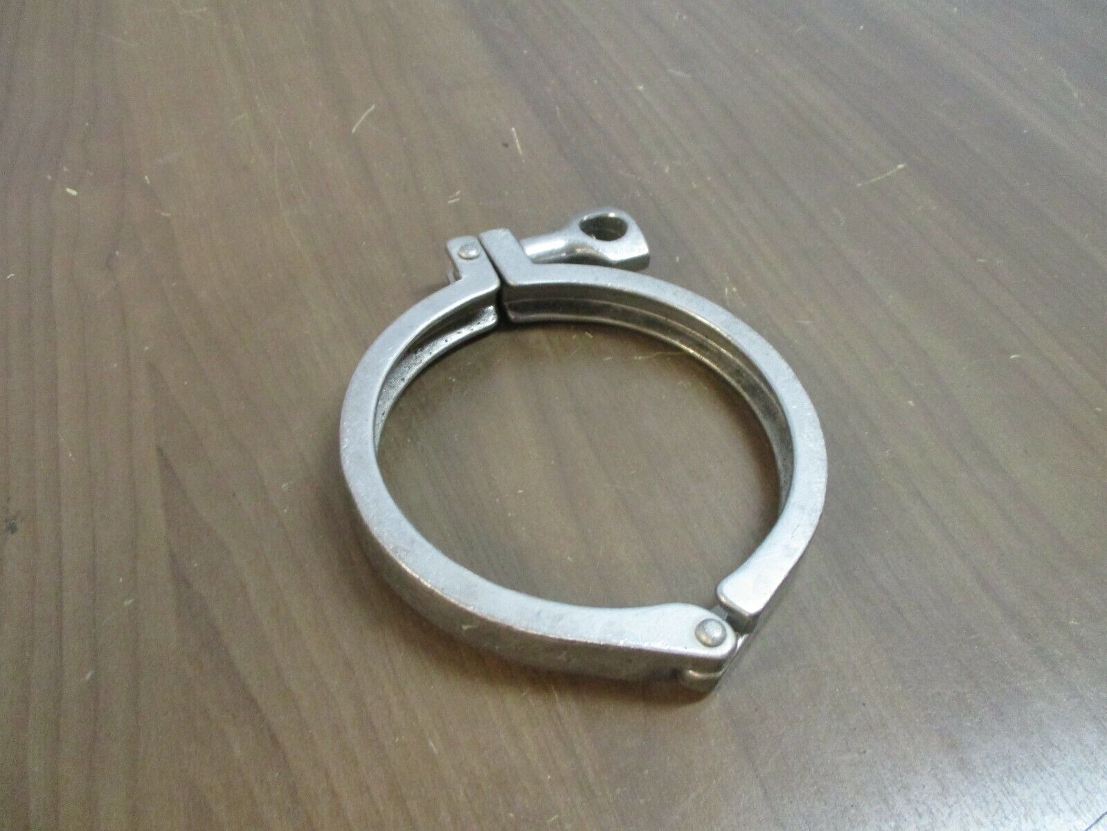 Misc. Brand Stainless Steel Sanitary Clamp Size: 4.5" Used