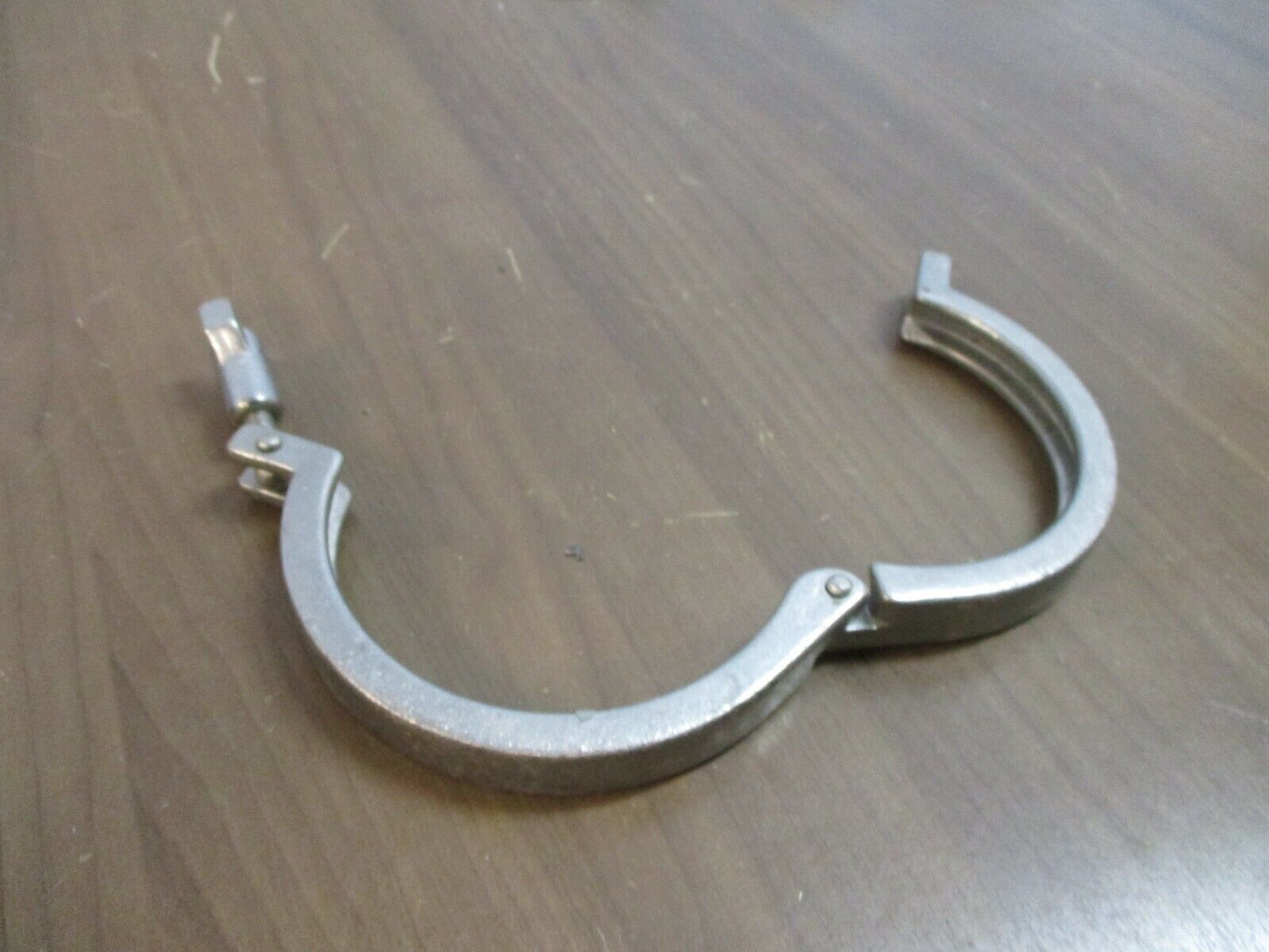 Misc. Brand Stainless Steel Sanitary Clamp Size: 4.5" Used