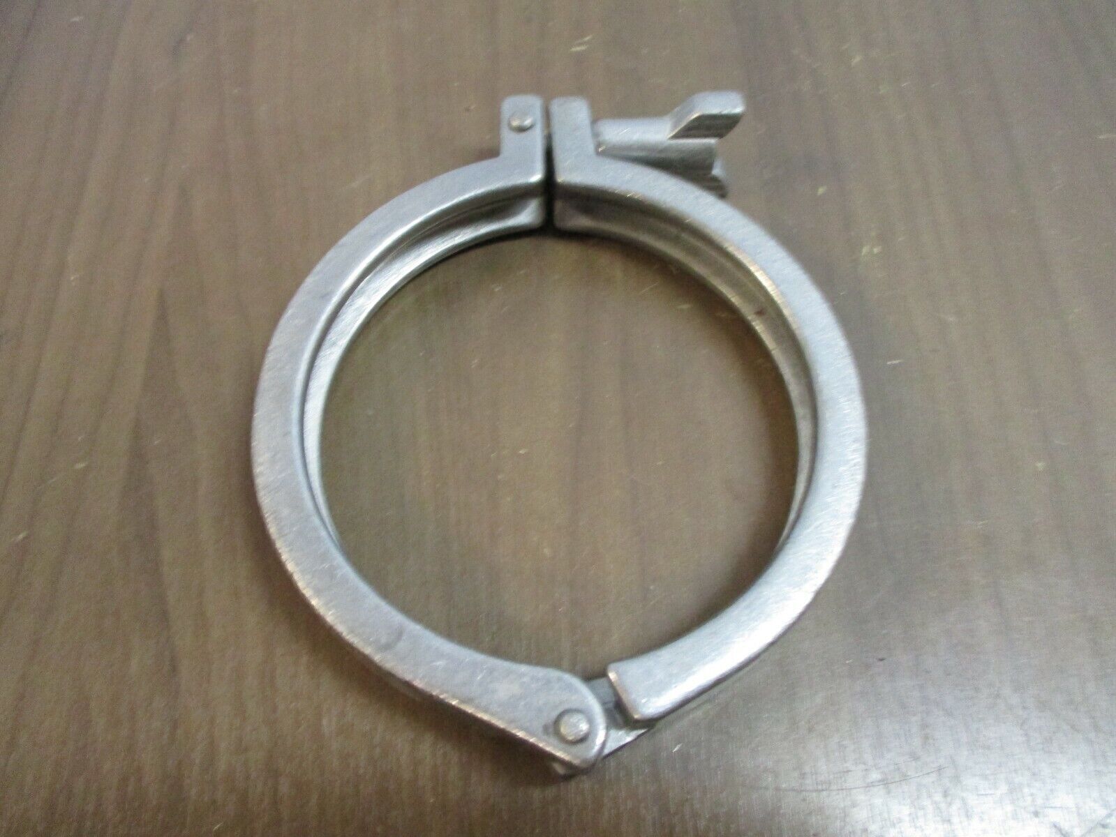 Misc. Brand Stainless Steel Sanitary Clamp Size: 4.5" Used