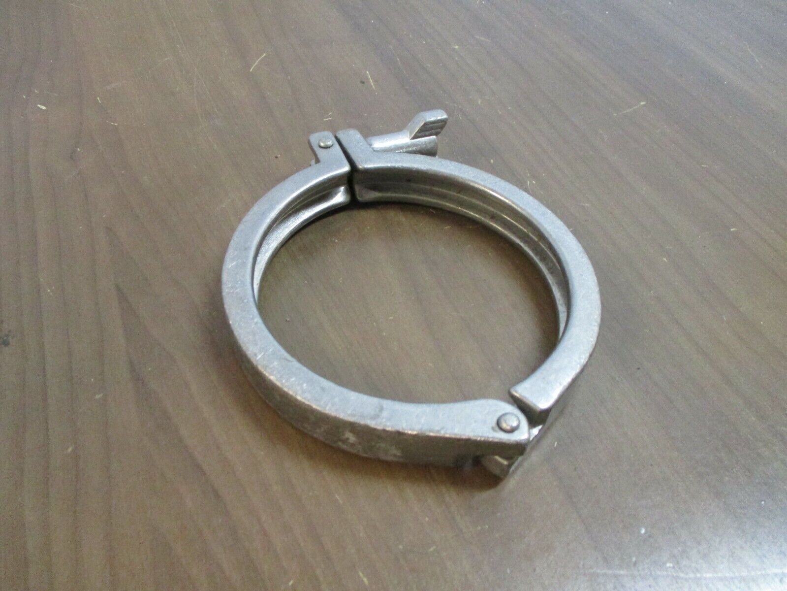 Misc. Brand Stainless Steel Sanitary Clamp Size: 4.5" Used