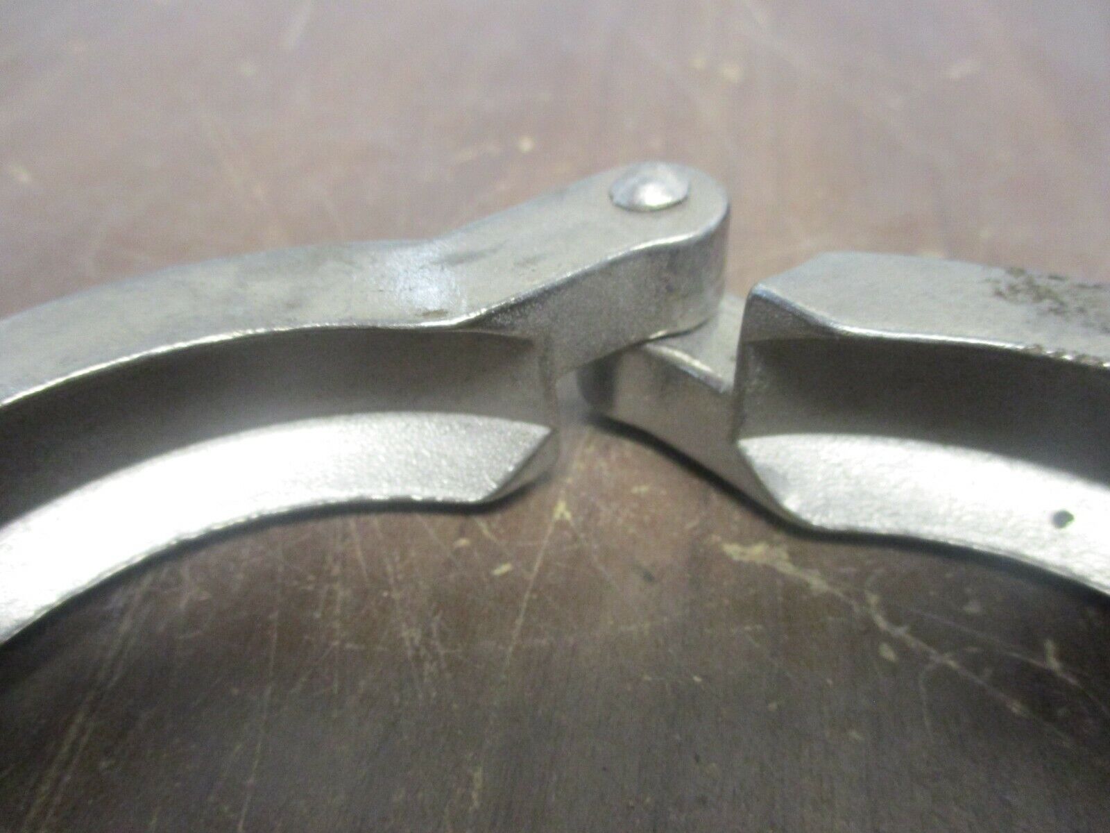 Misc. Brand Stainless Steel Sanitary Clamp Size: 2-1/2" Used