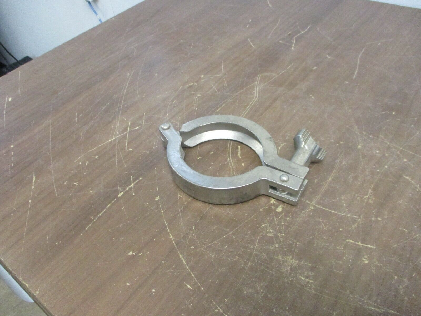 Misc. Brand Stainless Steel Sanitary Clamp Size: 2-1/2" Used