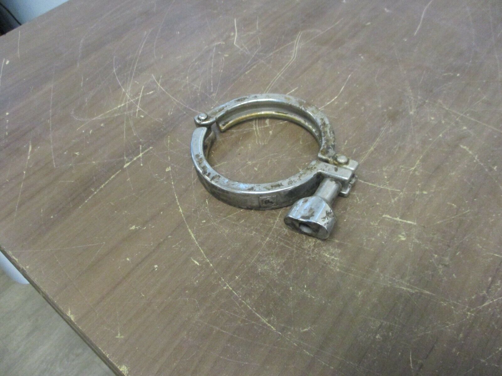 Misc. Brand Stainless Steel Sanitary Clamp Size: 3-1/4" Used