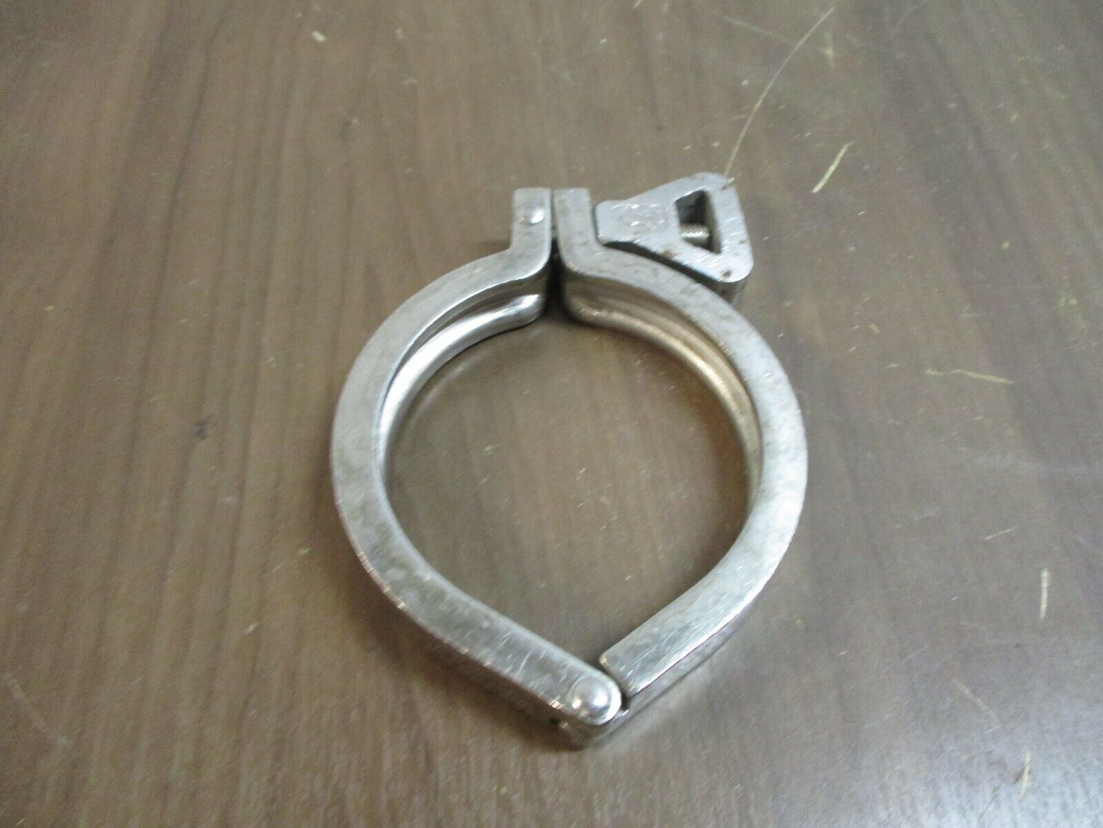 Misc. Brand Stainless Steel Sanitary Clamp Size: 3" Used