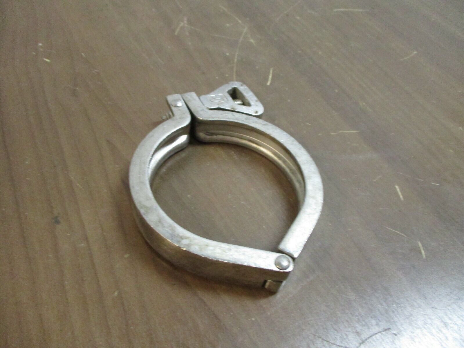 Misc. Brand Stainless Steel Sanitary Clamp Size: 3" Used
