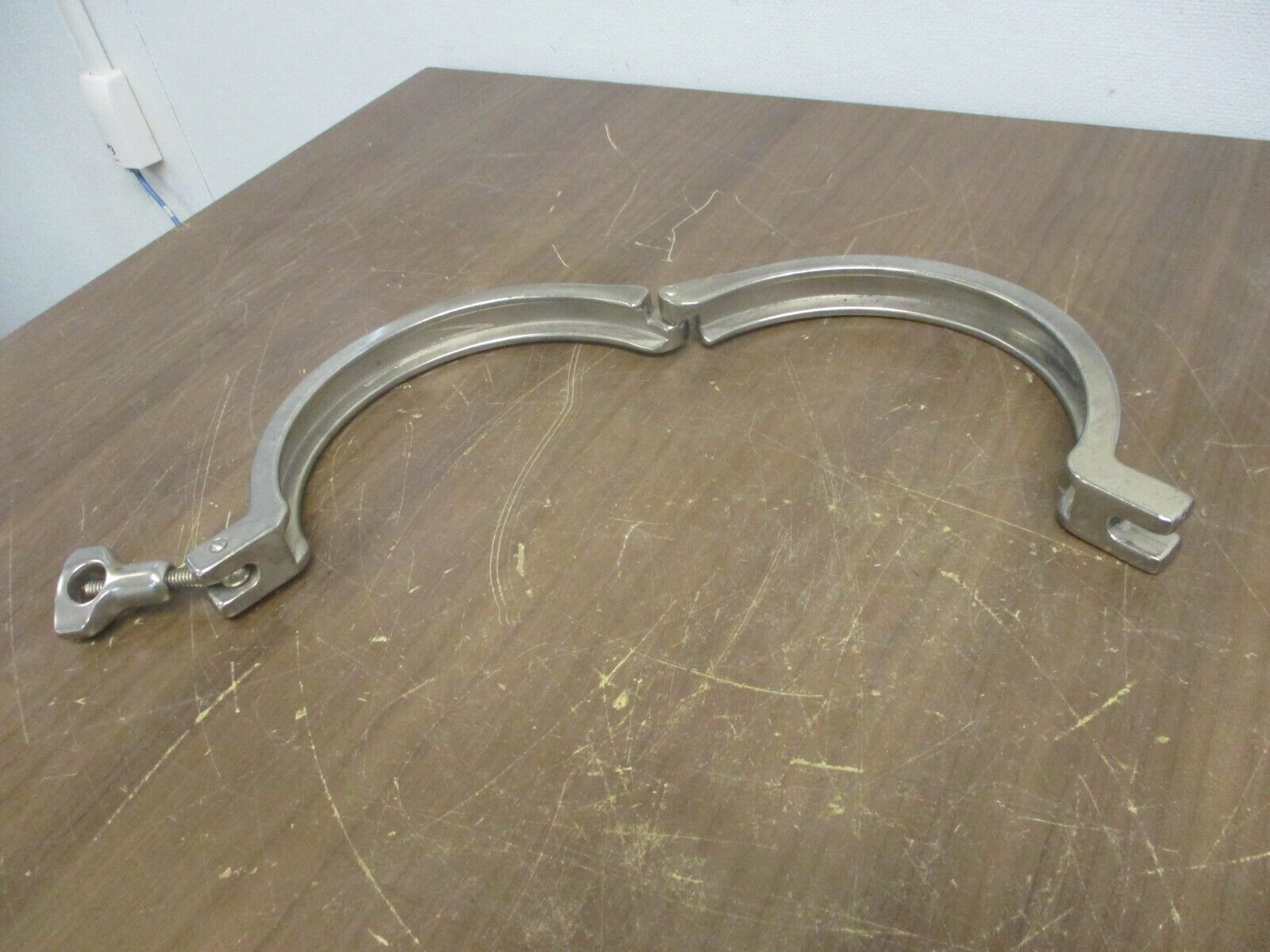 Misc. Brand Stainless Steel Sanitary Clamp Size: 6" Used
