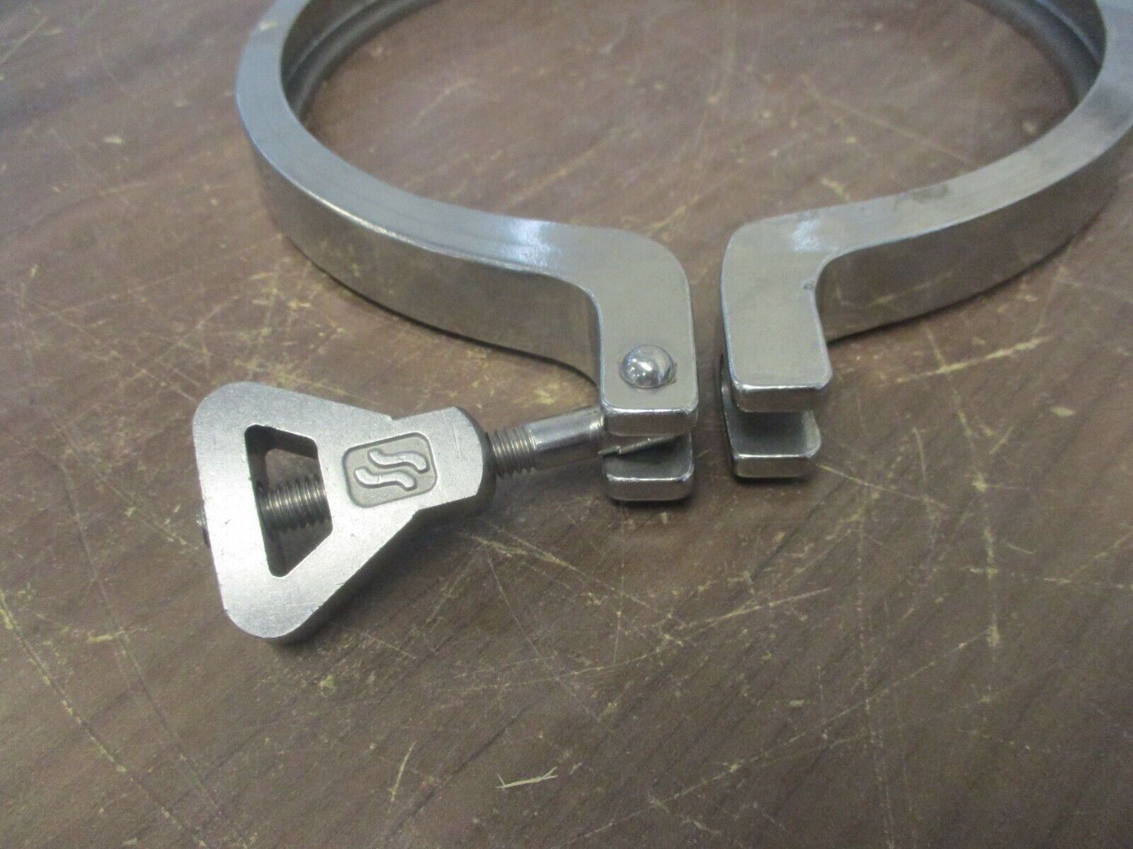 Misc. Brand Stainless Steel Sanitary Clamp Size: 8" Used