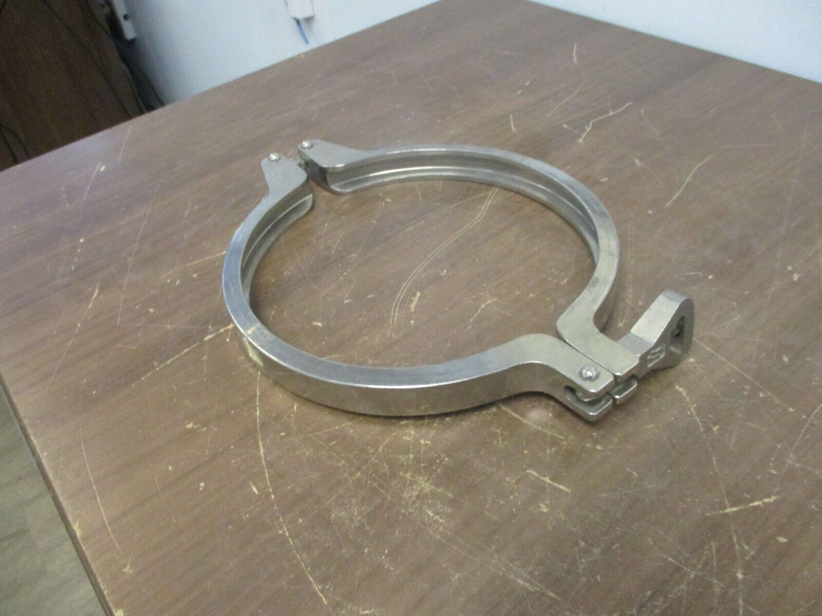 Misc. Brand Stainless Steel Sanitary Clamp Size: 8" Used