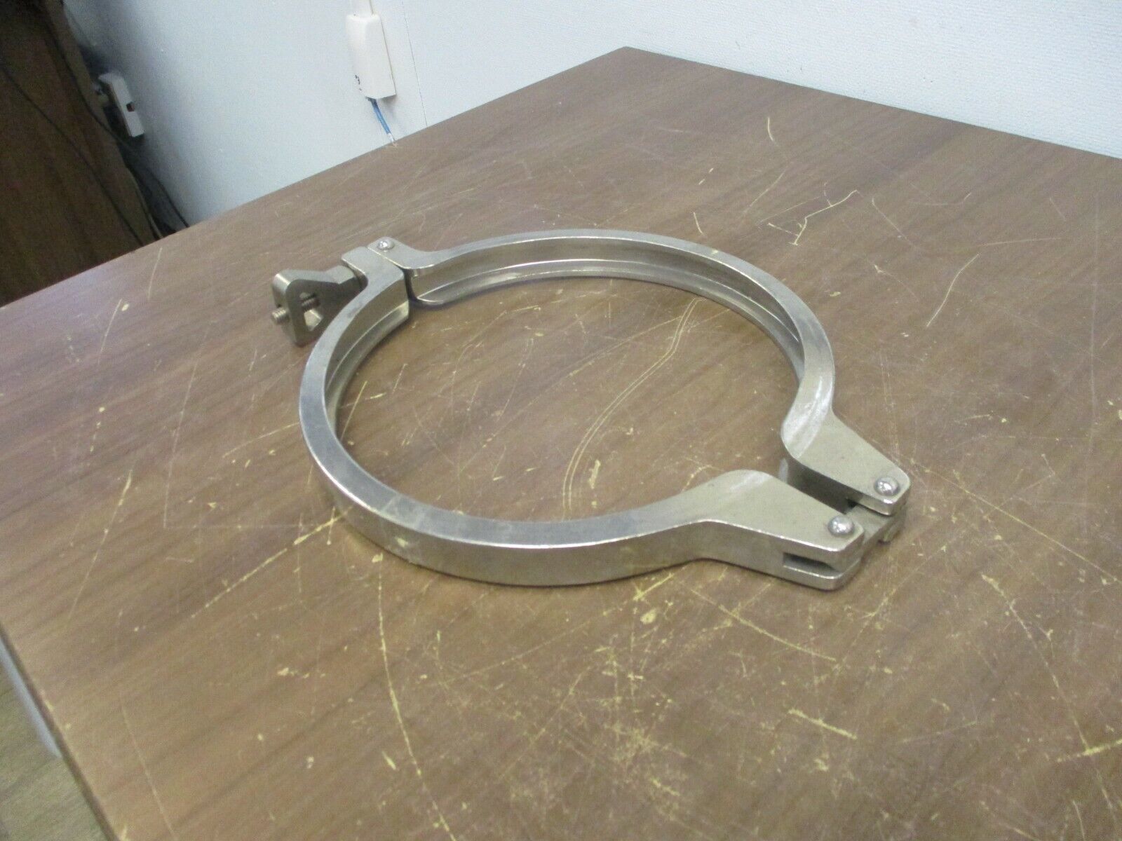 Misc. Brand Stainless Steel Sanitary Clamp Size: 8" Used