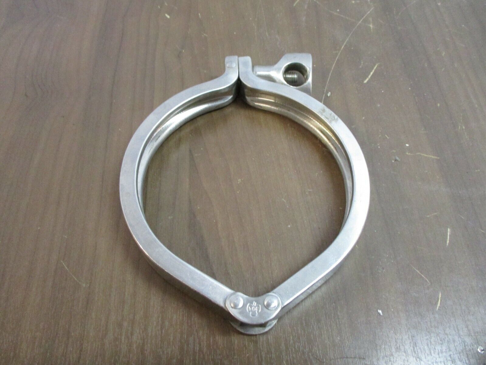 Misc. Brand Stainless Steel Sanitary Clamp Size: 4 3/4" Used