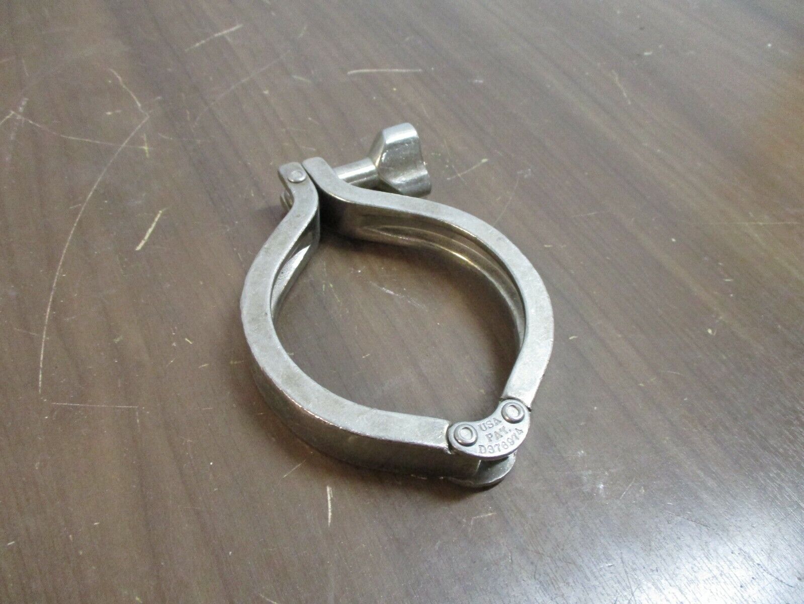 Misc. Brand Stainless Steel Sanitary Clamp Size: 3-1/4" Used