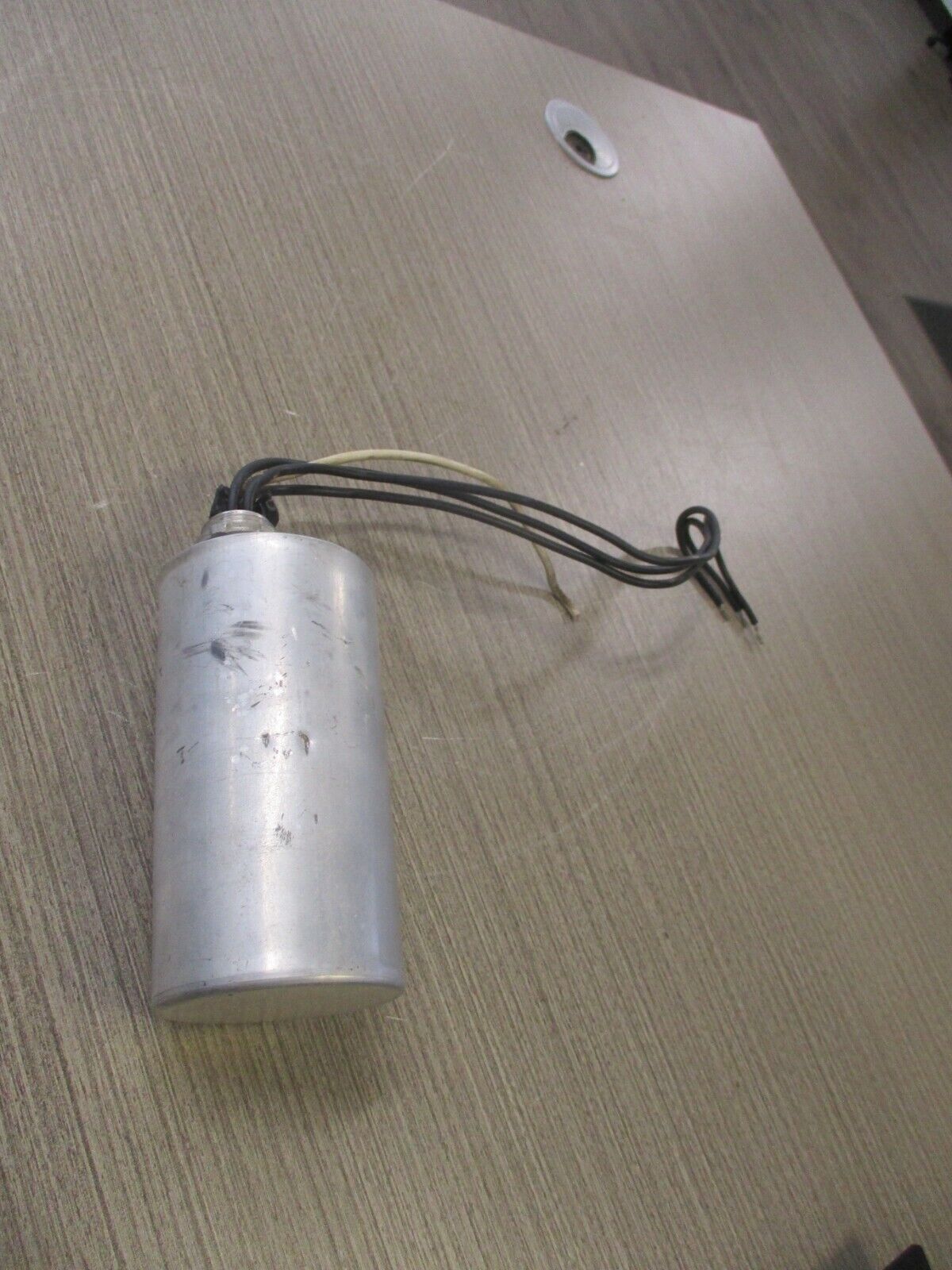 GE Protective Capacitor 9L18BAB301 650V 60Hz 3P. Used.