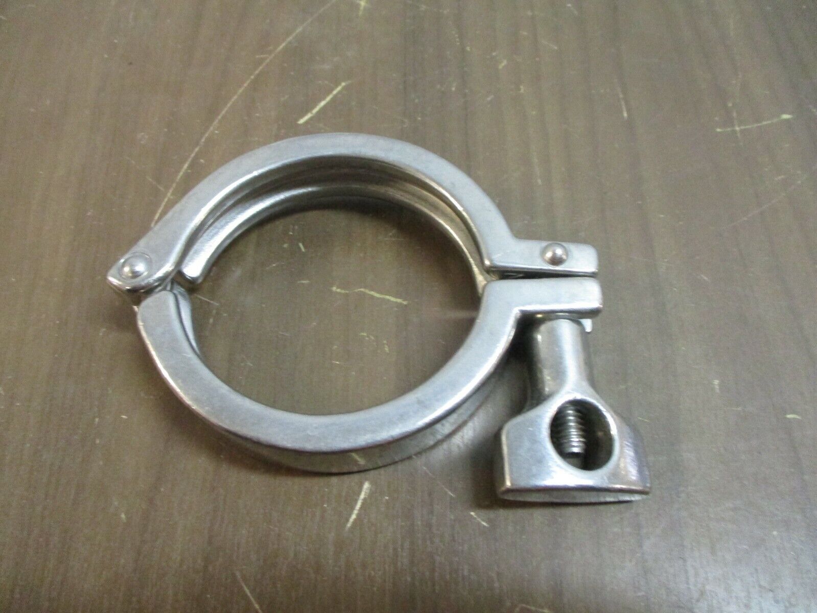 Misc. Brand Stainless Steel Sanitary Clamp Size: 2-3/4" Used