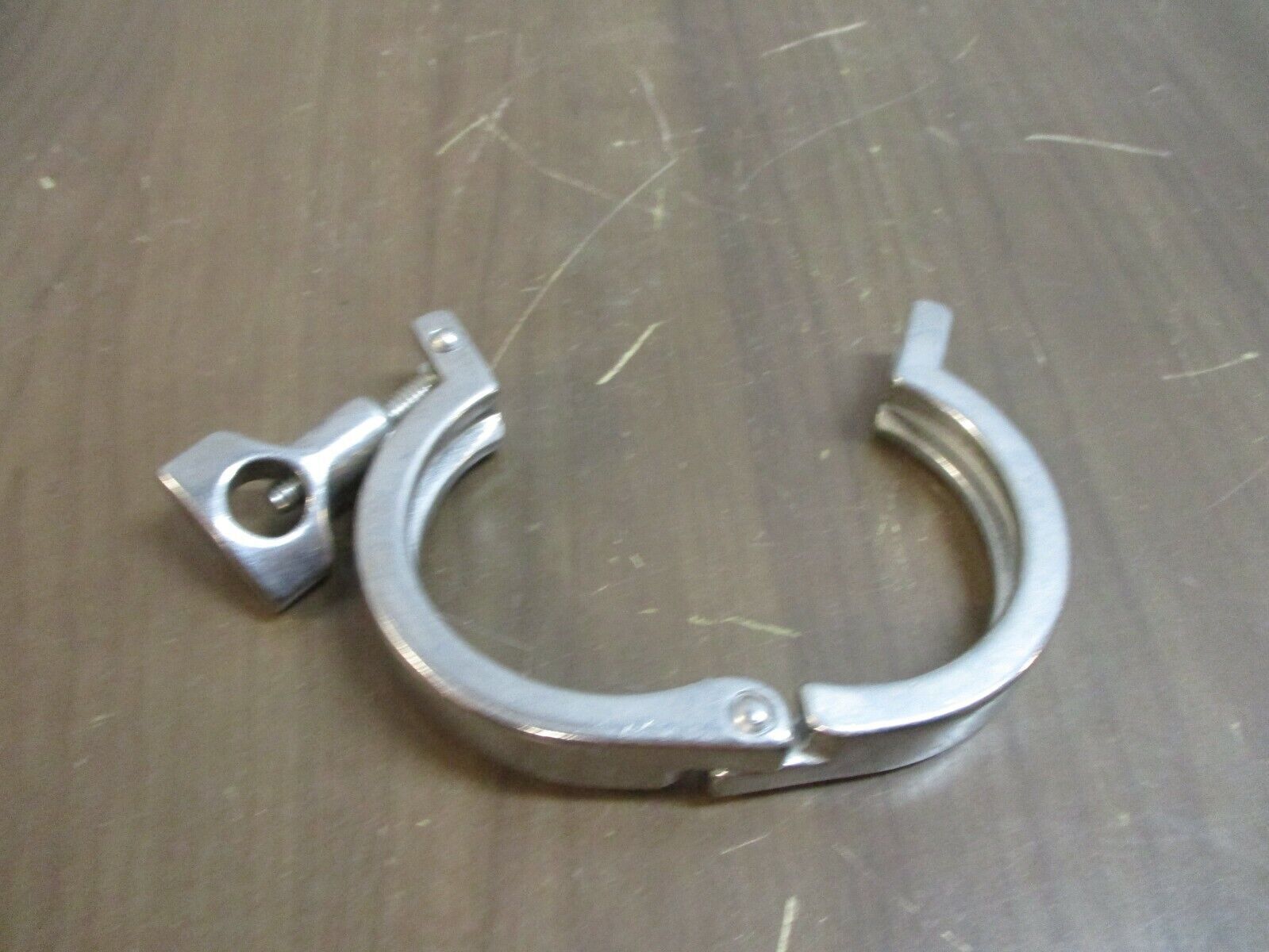 Misc. Brand Stainless Steel Sanitary Clamp Size: 2-3/4" Used