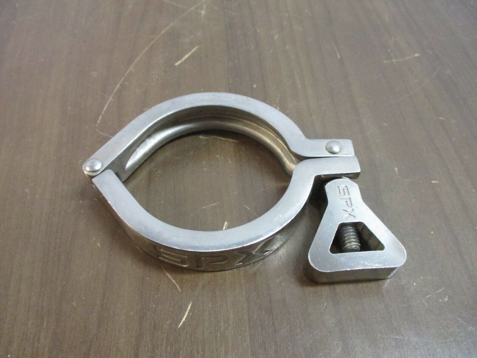 Misc. Brand Sanitary Clamp Size: 2-3/4" Used