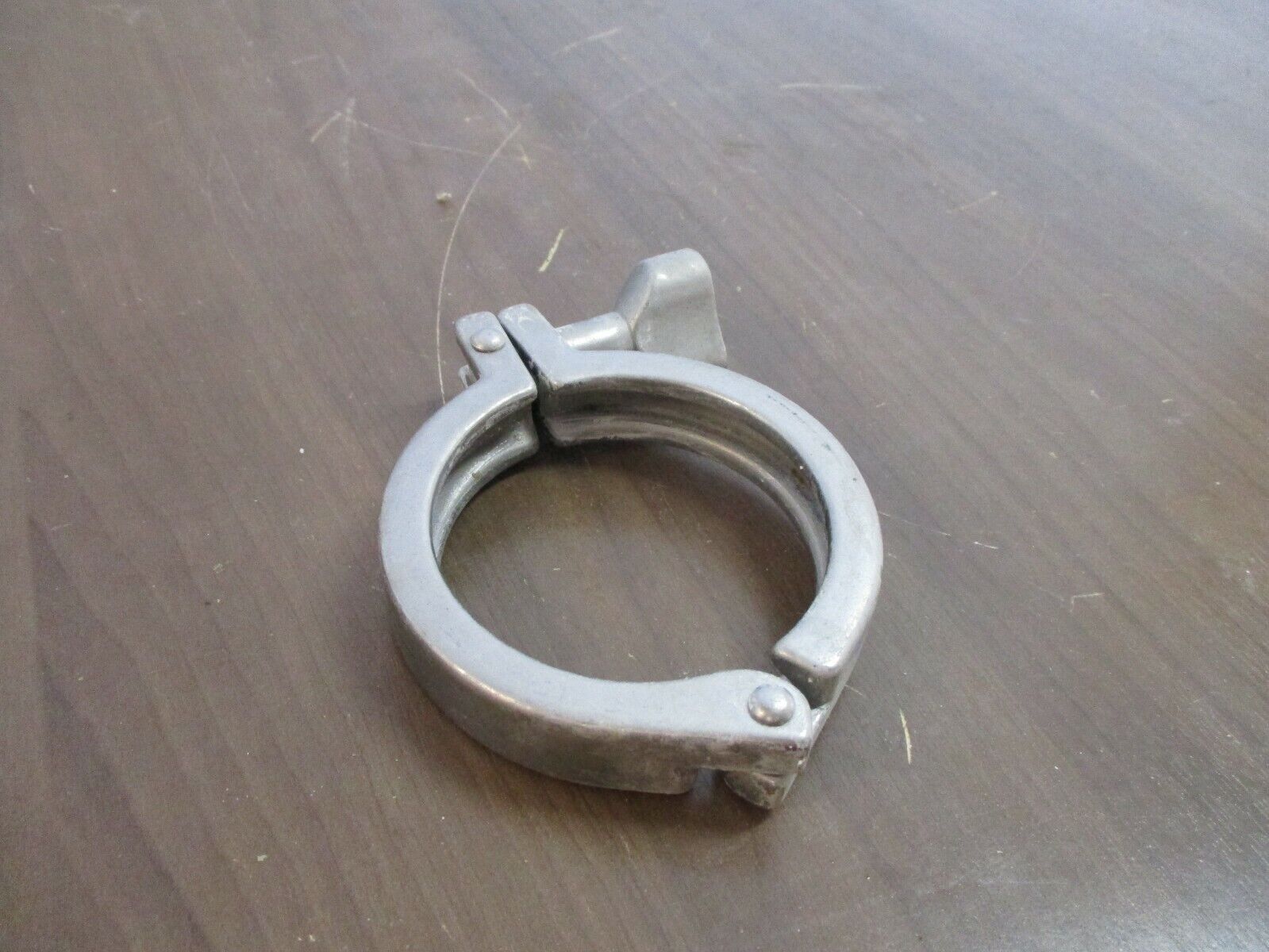 Misc. Brand Stainless Steel Sanitary Clamp Size: 3" Used