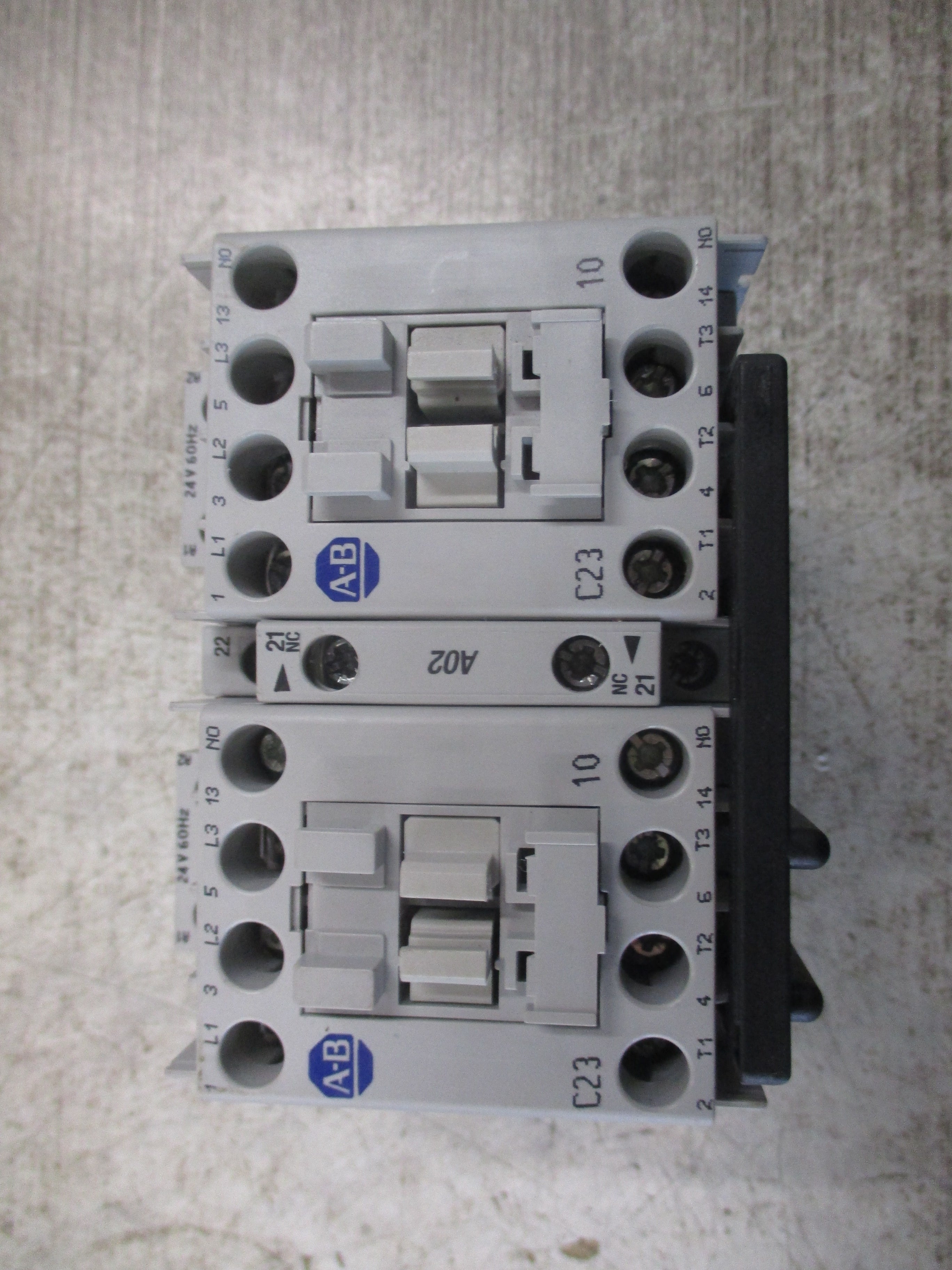 Allen-Bradley Reversing Contactor 104-C23J22 Ser. D 24V Coil 30A 600V Used