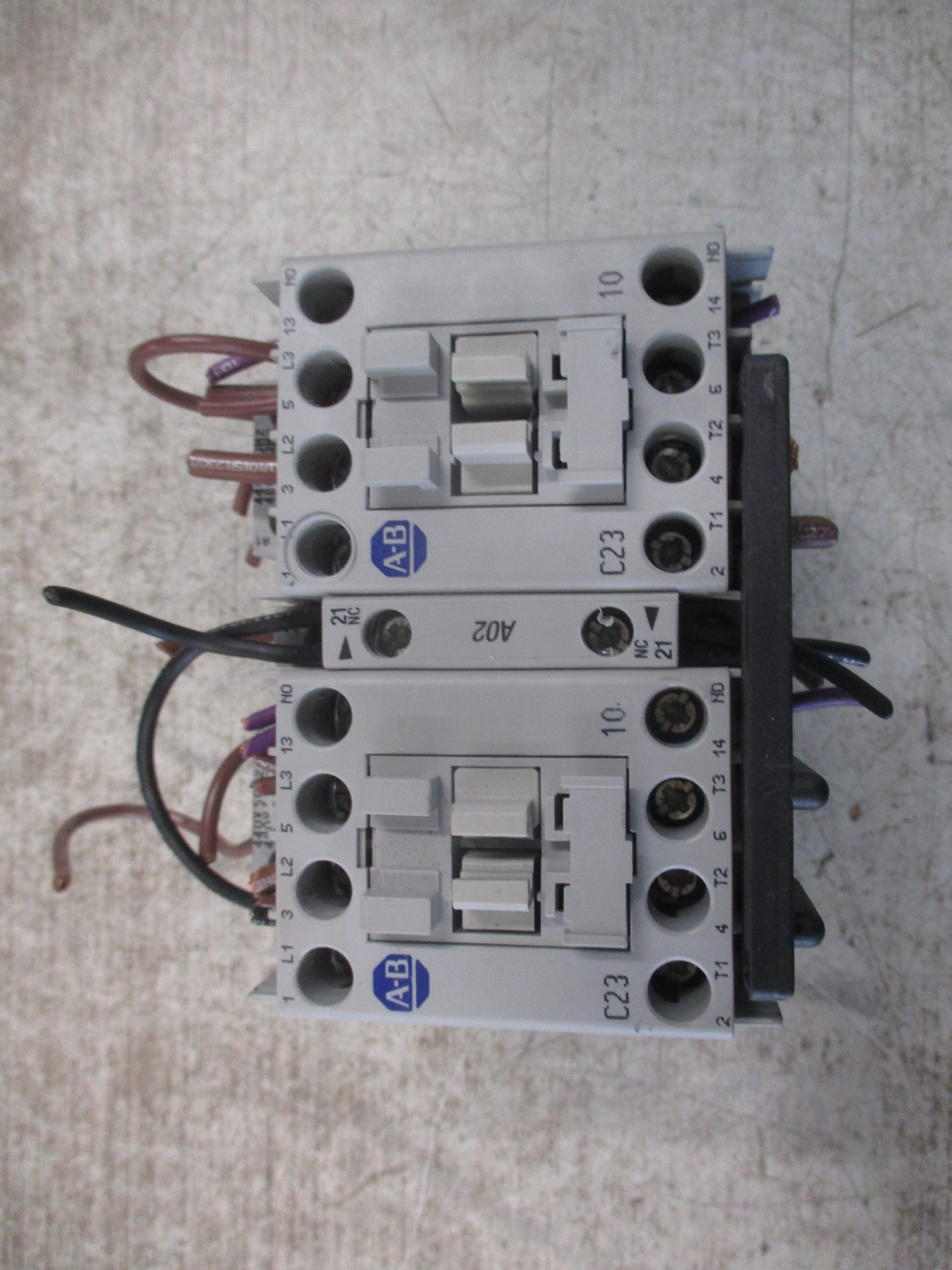 Allen-Bradley Reversing Contactor 104-C23B22 Ser. D 480V Coil 30A 600V Used